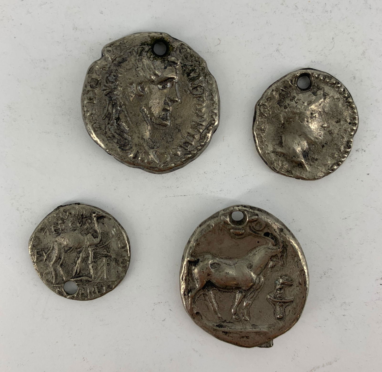 LOT OF FOUR ANCIENT COIN TYPE COINS/TOKENS (1 of 2)