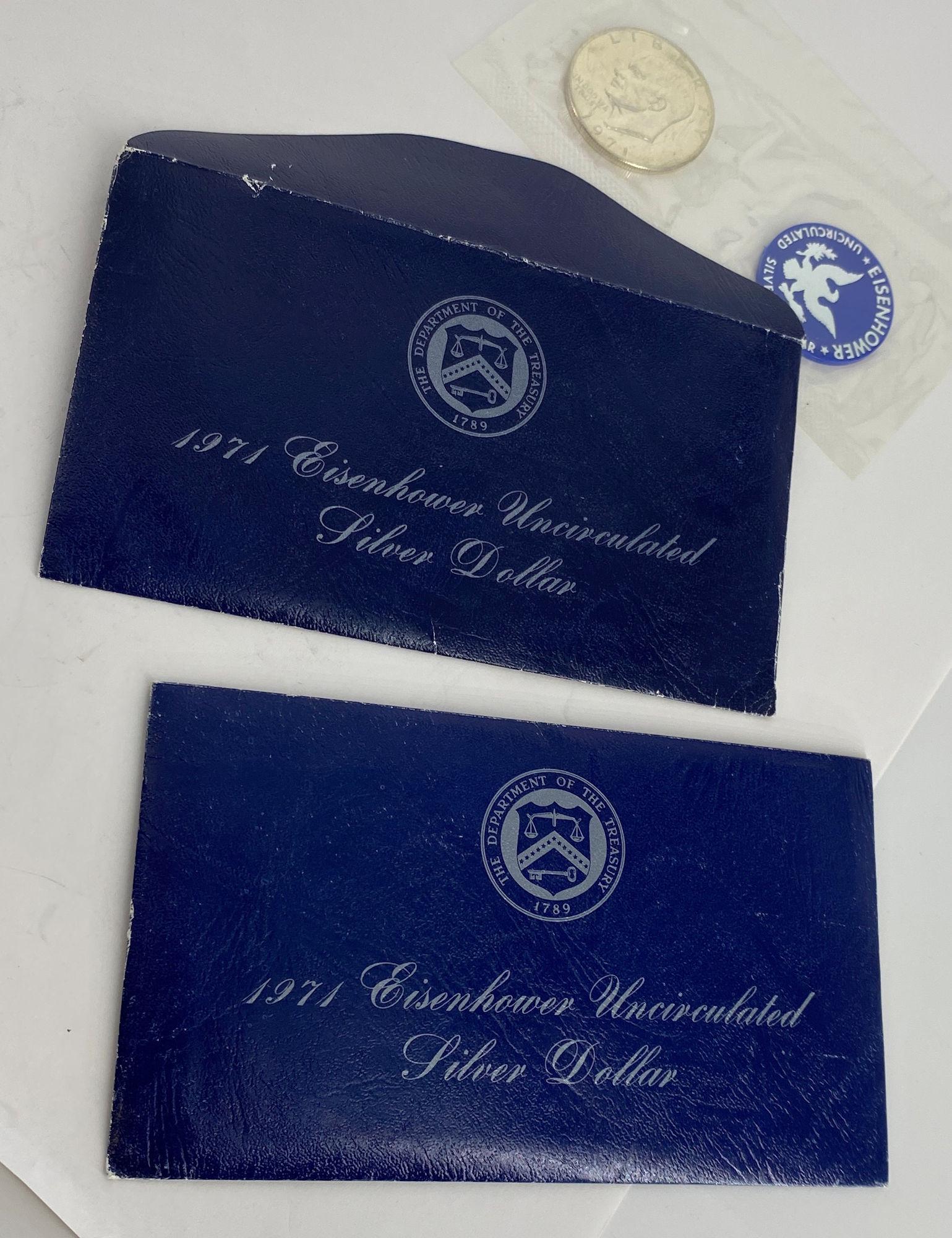 TWO EISENHOWER SILVER UNCIRCULATED DOLLAR COINS (1 of 3)