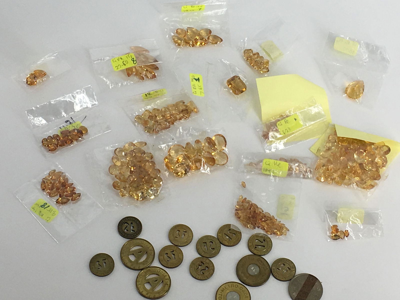 LOOSE GEMSTONES AND SUBWAY TOKENS (1 of 9)