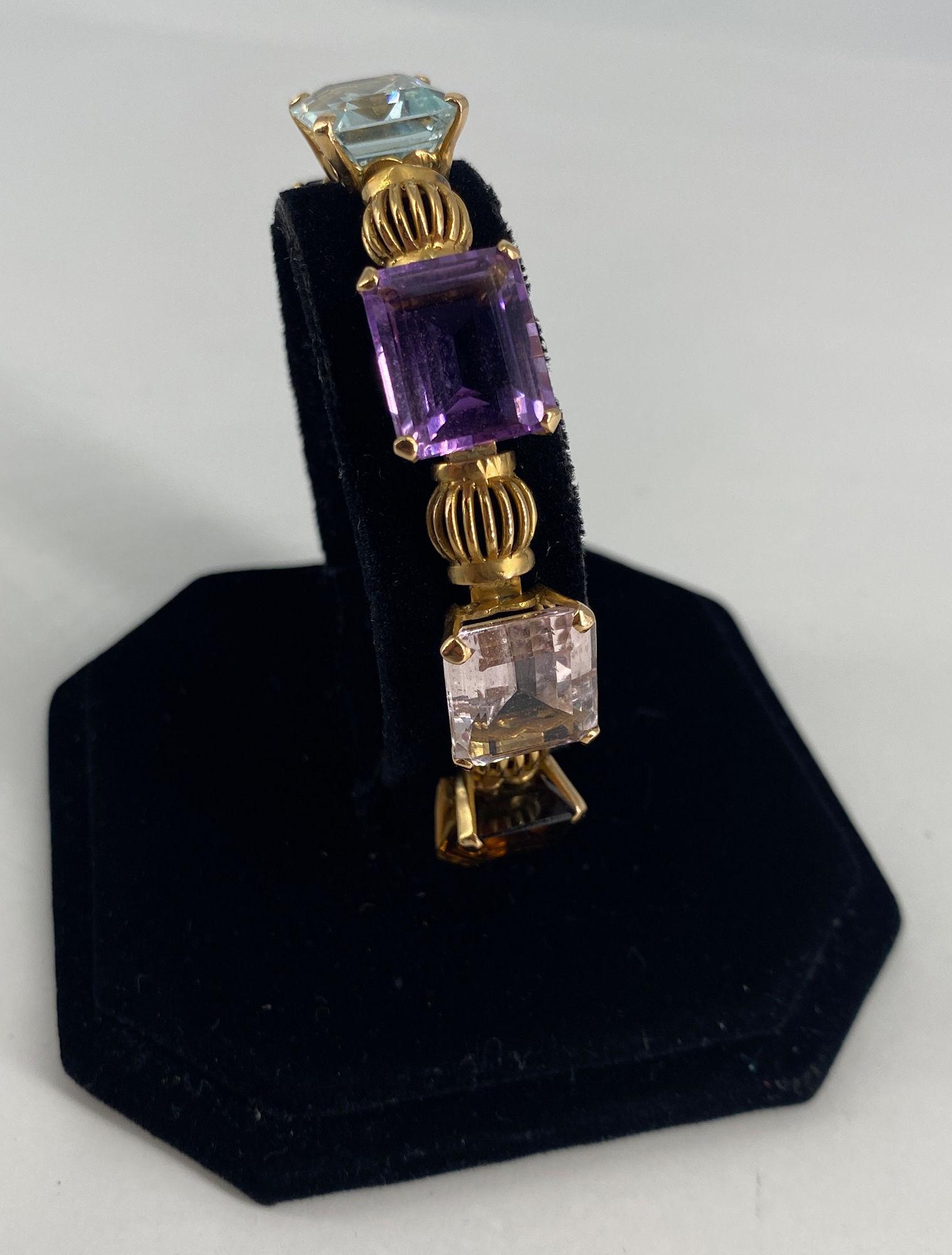 18KT YELLOW GOLD AND GEMSTONE BRACELET (1 of 16)