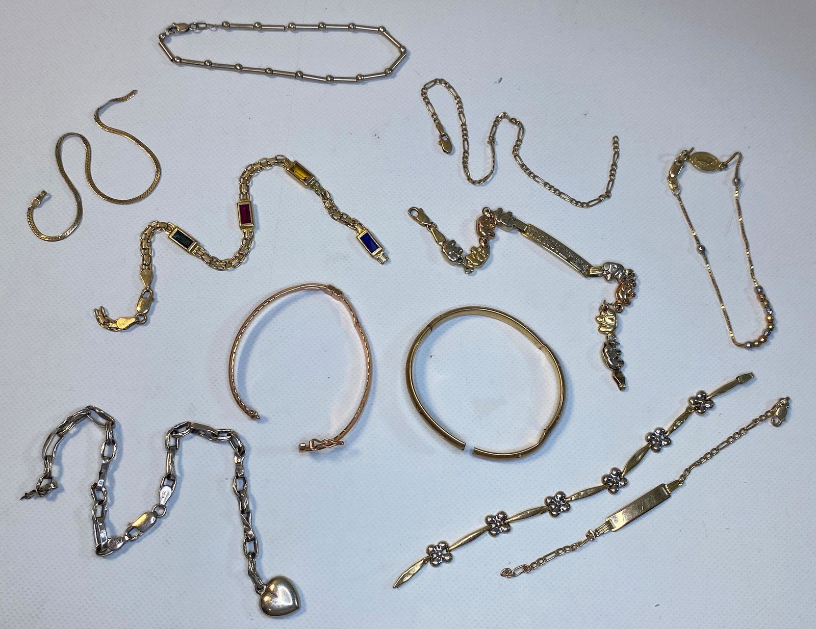 11 GOLD BRACELETS (1 of 11)