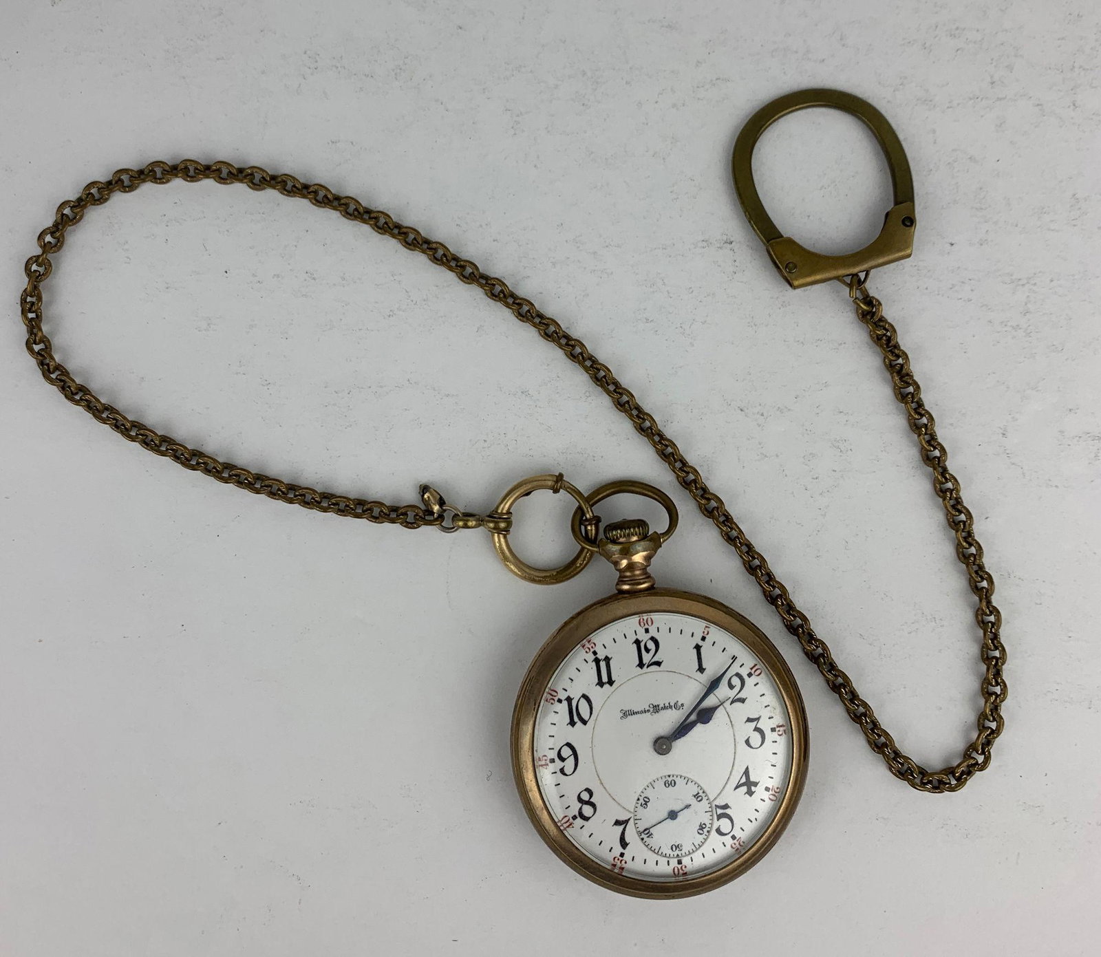 ILLINOIS POCKET WATCH: ILLINOIS POCKET WATCH ~ SCREW OPEN CASE. LEVER SET. WINDS, SETS, AND TICKS AT TIME OF LISTING. WHITE FACE WITH BLACK NUMERIC INDICATORS. 1.875" CASE FROM WINDSOR (20 YEAR). 21-JEWEL MOVEMENT, 5 POSITI