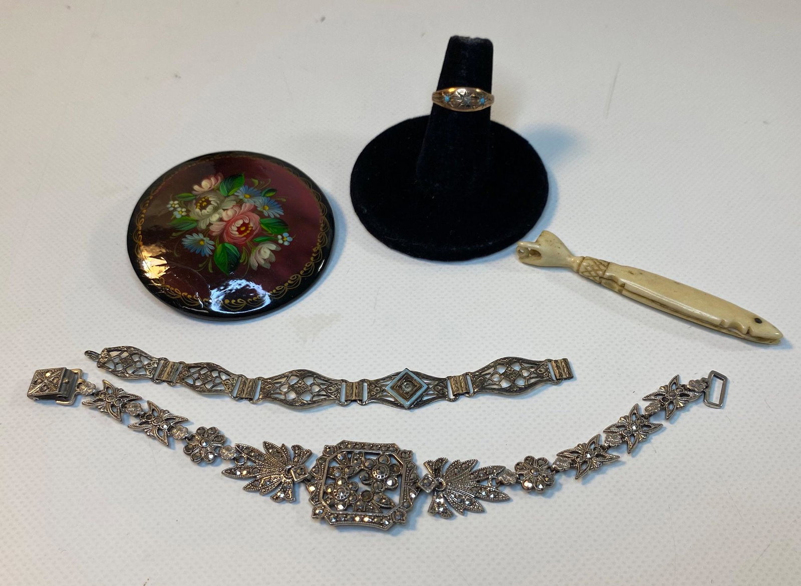 VINTAGE TO MODERN ACCESSORIES: VINTAGE TO MODERN ACCESSORIES ~ LOT INCLUDES 6.25" STERLING SILVER AND MARCASITE BRACELET WITH FLORAL MOTIF AND FOLDOVER CLASP - SOME STONES ARE MISSING, BROKEN STERLING SILVER OPENWORK BRACELET, VINT