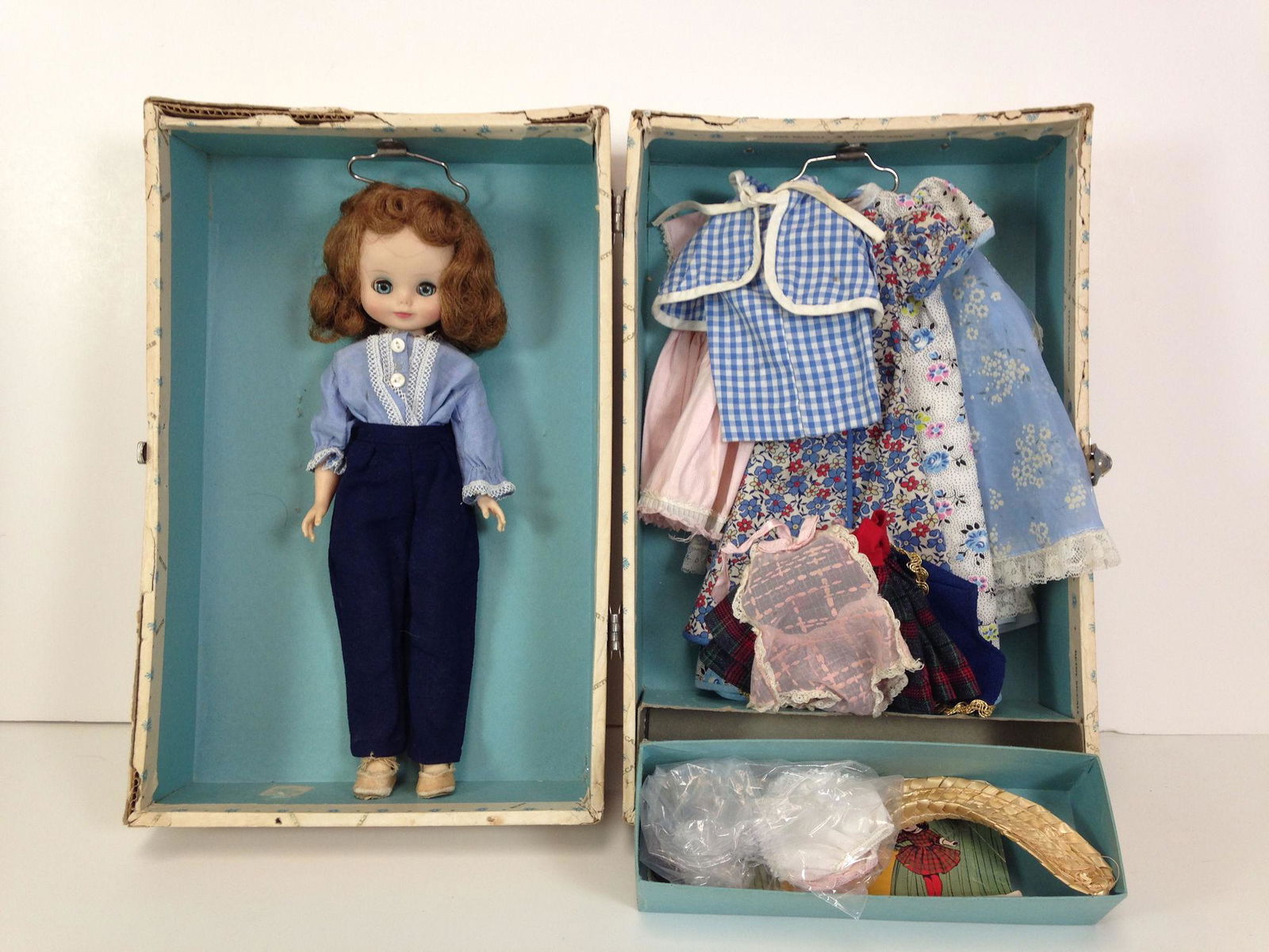 13" VINTAGE AMERICAN CHARACTER VINYL BETSY McCALL IN: 13" VINTAGE AMERICAN CHARACTER VINYL BETSY McCALL IN HER TRUNK WITH EXTRA CLOTHING AND ACCESSORIES.