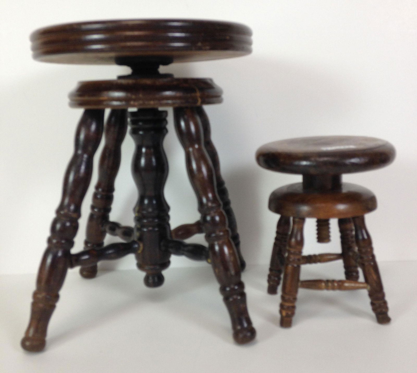 (2) DOLL PIANO STOOLS. BOTH SEATS ROTATE TO RAISE OR (1 of 1)