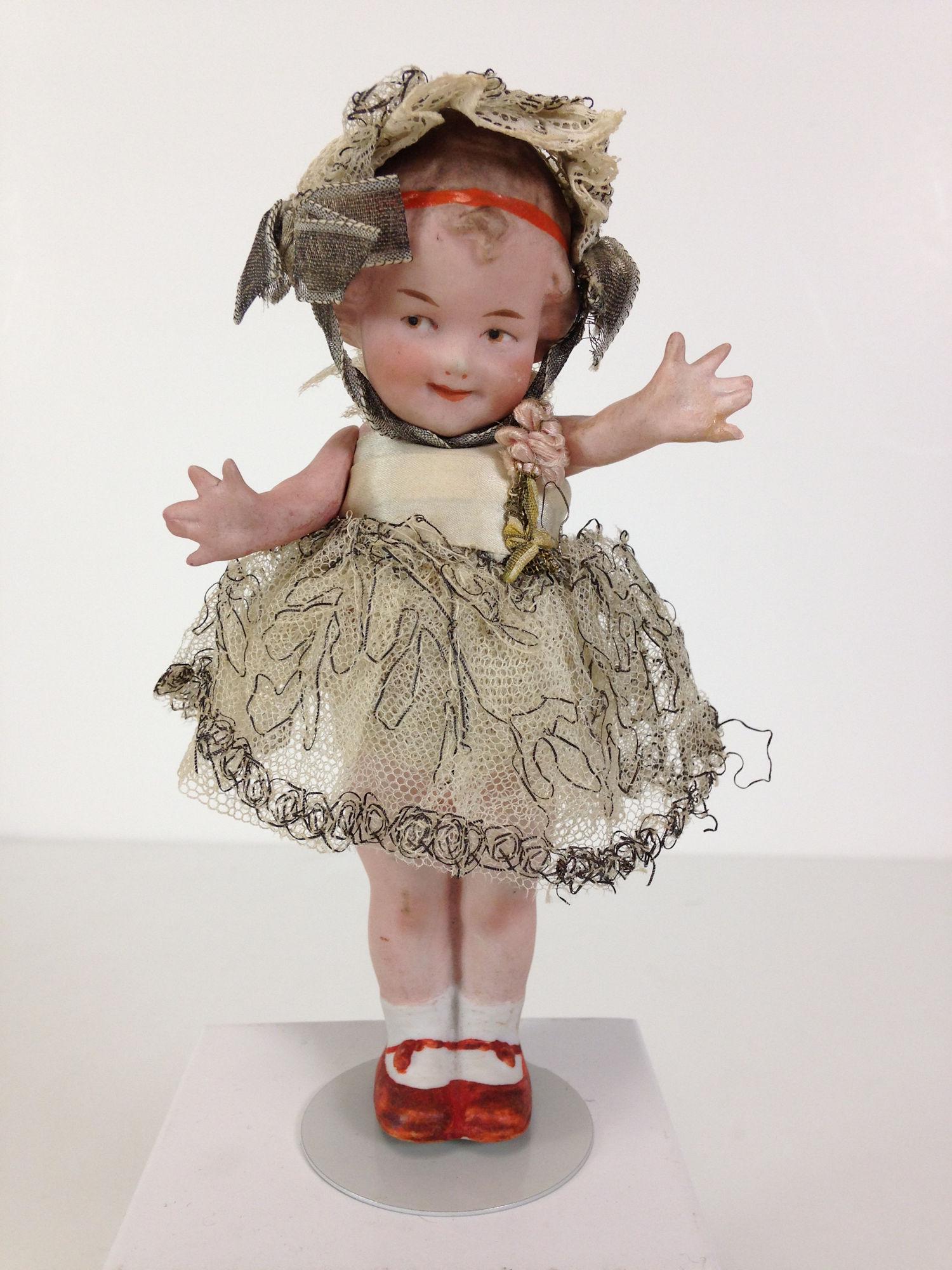 5Â½" UNMARKED GBR. HEUBACH ALL BISQUE CHARACTER DOLL. (1 of 3)