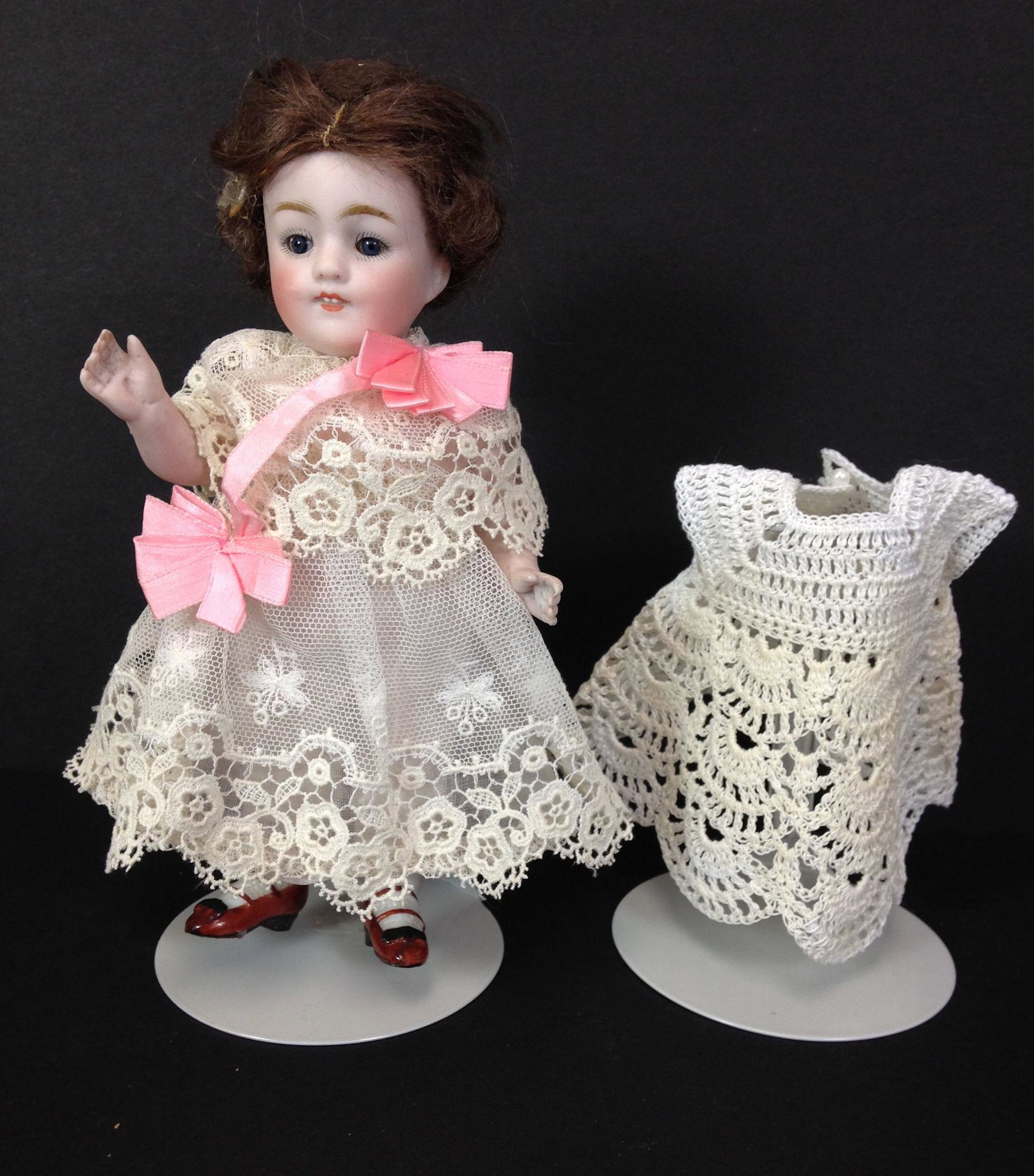 7" KESTNER 150 ALL BISQUE CHILD DOLL. MOHAIR WIG,: 7" KESTNER 150 ALL BISQUE CHILD DOLL. MOHAIR WIG, GLASS SLEEP EYES AND OPEN MOUTH WITH TEETH. ONE-PIECE HEAD AND TORSO, JOINTED ARMS AND LEGS WITH PAINTED STOCKINGS AND TWO-STRAP BROWN SHOES. DRESSED 