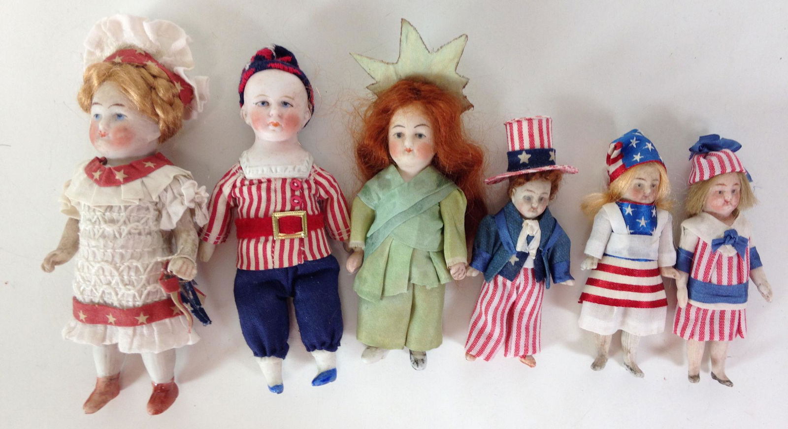 LOT (6) SMALL BISQUE DOLLS DRESSED IN PATRIOTIC (1 of 2)