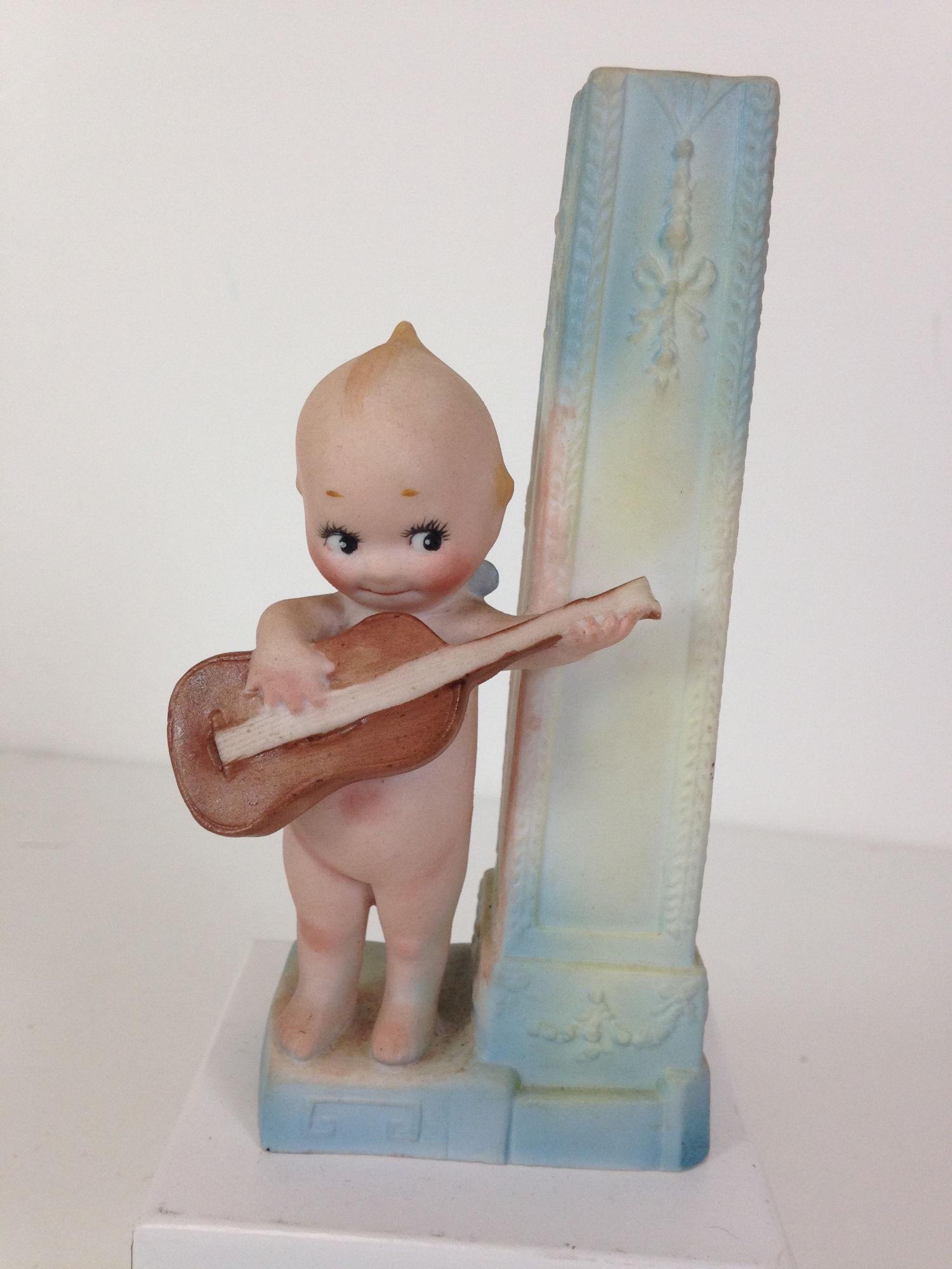 5Â½" ANTIQUE ROSE O'NEILL ALL BISQUE KEWPIE PLAYING (1 of 2)
