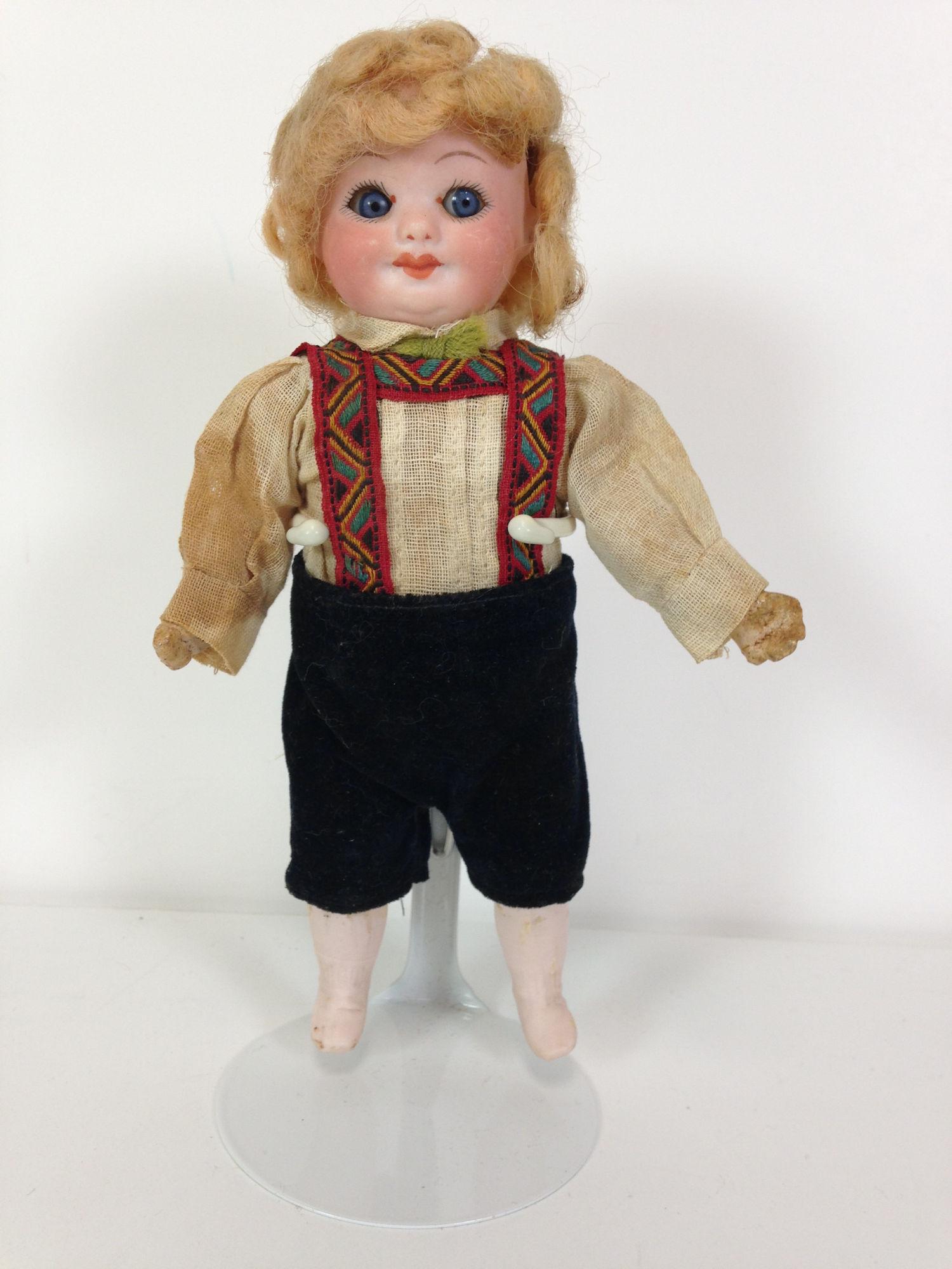 7Â½" A.M. 323 BISQUE SOCKET HEAD GOOGLY.  MOHAIR WIG, (1 of 3)