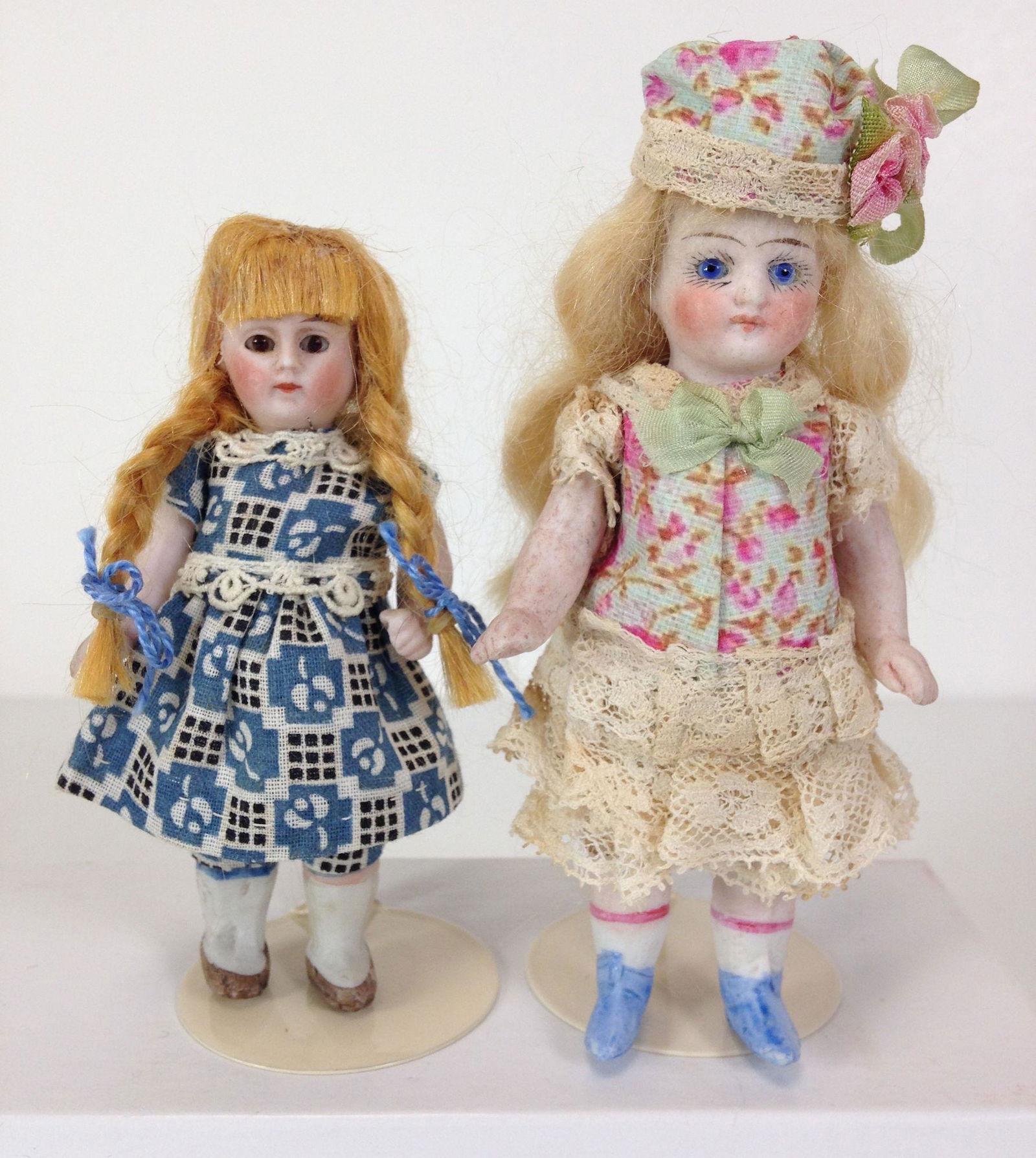 (2) LIKELY GERMAN ALL BISQUE DOLLS WITH GLASS EYES. (1 of 1)