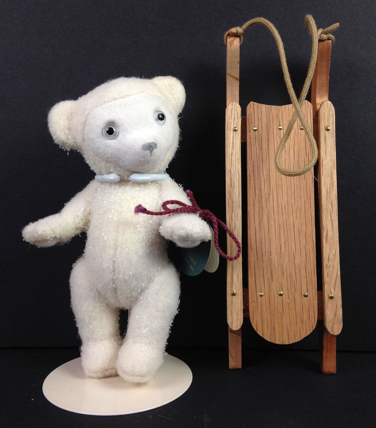 6" R. JOHN WRIGHT CHRISTMAS IN JULY "SNOWBEAR", SECOND: 6" R. JOHN WRIGHT CHRISTMAS IN JULY "SNOWBEAR", SECOND PIECE IN THE SNOWBABY COLLECTION. SPARKLE ENCRUSTED WOOL PLUSH WITH MOLDED FELT FACE WITH HAND PAINTED FEATURES, FULLY JOINTED, FELT PAW PADS, IN