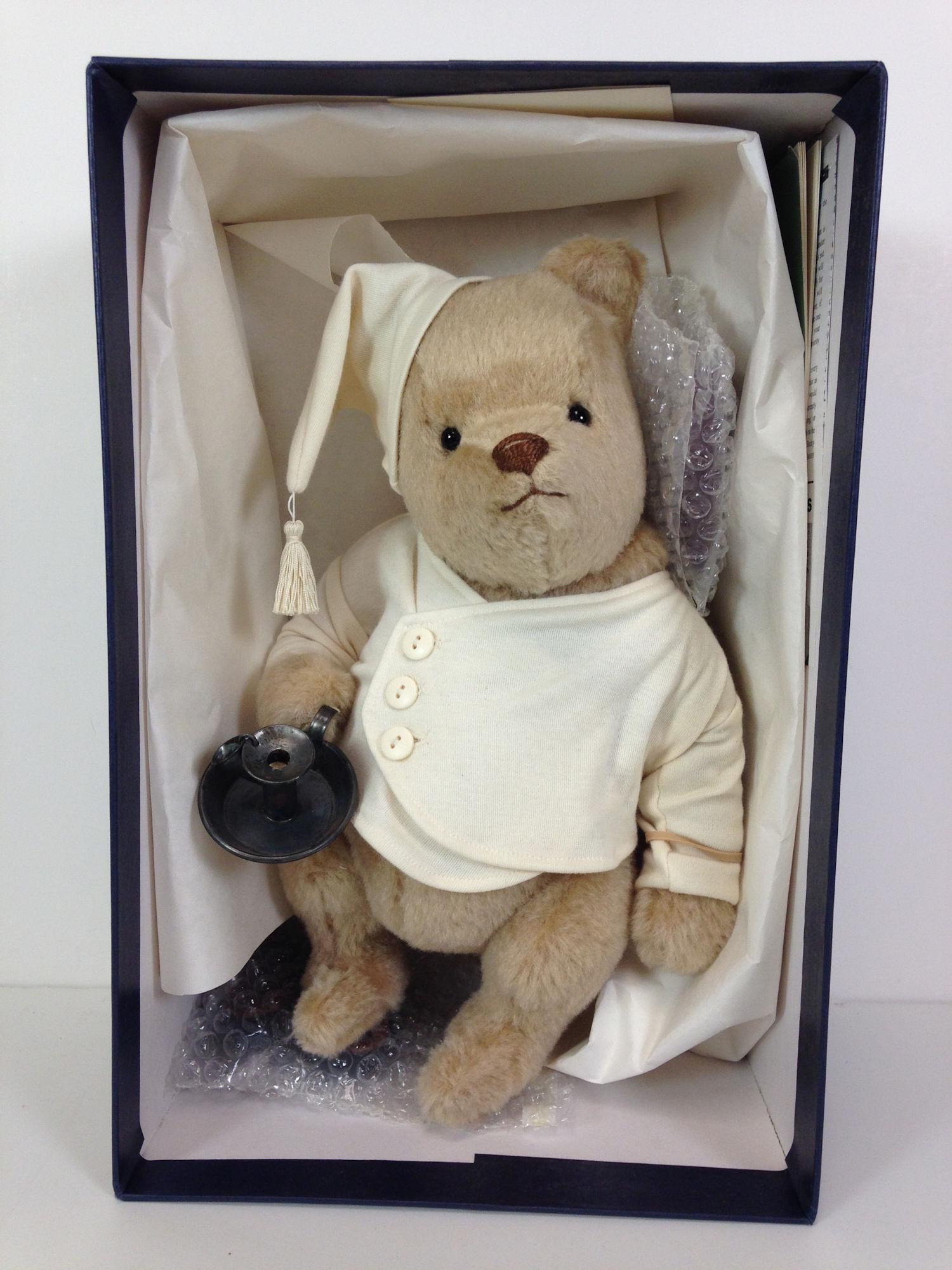 12" R. JOHN WRIGHT "NIGHTTIME WINNIE-THE-POOH". MOHAIR: 12" R. JOHN WRIGHT "NIGHTTIME WINNIE-THE-POOH". MOHAIR PLUSH, JOINTED AT NECK, SHOULDERS AND HIPS, DRESSED IN COTTON NIGHTSHIRT AND CAP, FELT SLIPPERS WITH LEATHER SOLES. COMES WITH HAND-CRAFTED TIN C