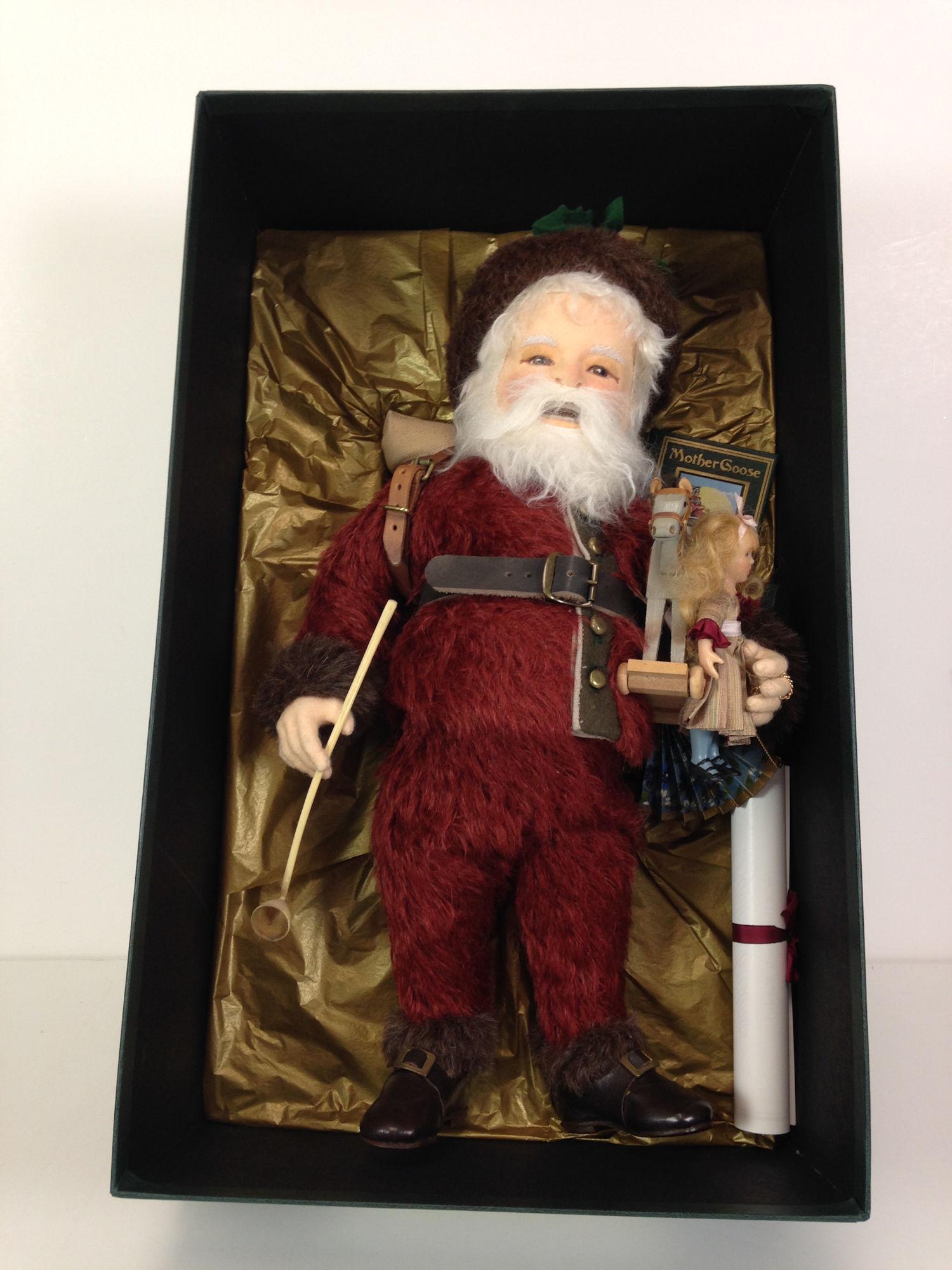 R. JOHN WRIGHT "THOMAS NAST'S SANTA CLAUS". 15 1/2": R. JOHN WRIGHT "THOMAS NAST'S SANTA CLAUS". 15 1/2" OVERALL, FULLY JOINTED MOLDED FELT, HAND PAINTED FACIAL FEATURES, MOHAIR WIG AND BEARD, DRESSED IN CUSTOM-DYED MOHAIR SUIT AND CAP TRIMMED IN ALPACA