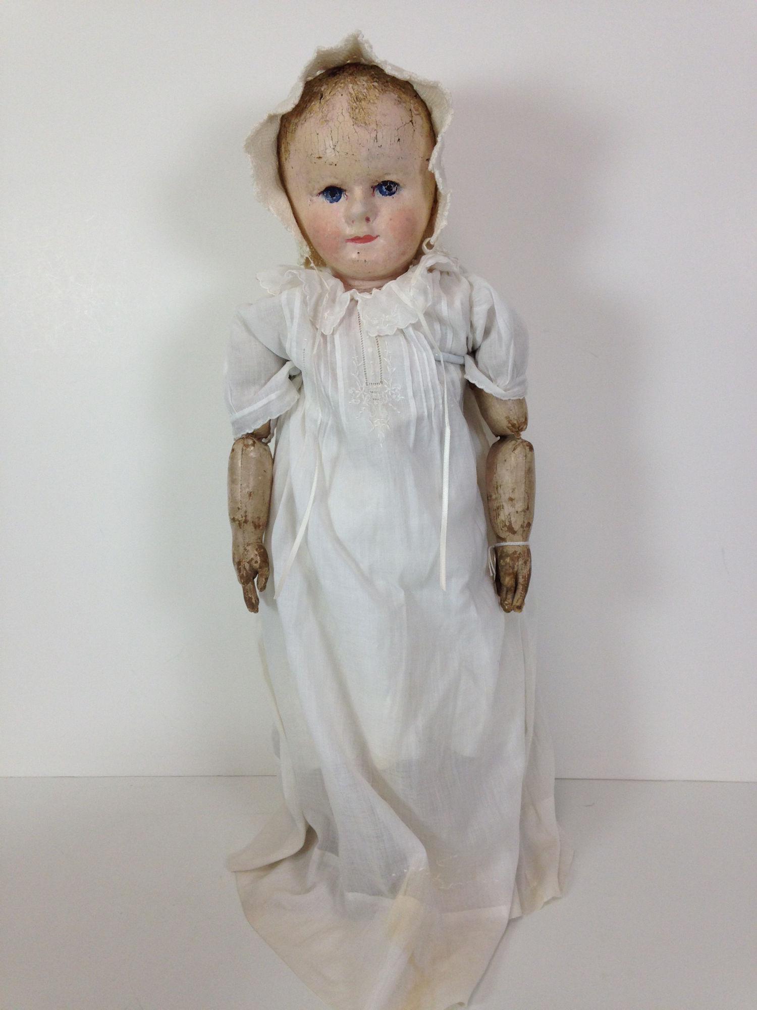 20" MARTHA CHASE BABY WITH ORIGINAL PAINT. STOCKINET: 20" MARTHA CHASE BABY WITH ORIGINAL PAINT. STOCKINET HEAD AND LIMBS WITH OIL PAINTED HAIR AND FACIAL FEATURES. SATEEN SLIP-COVERED CLOTH BODY JOINTED AT SHOULDERS, ELBOWS, HIPS AND KNEES. WEARS VINTAG