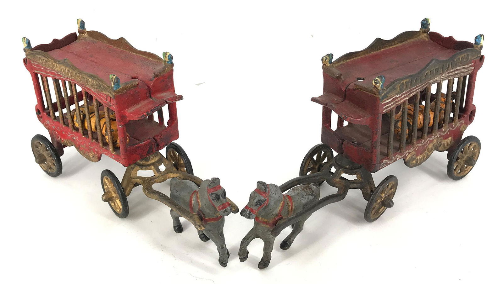 REPRODUCTION 2 CAST IRON CIRCUS CART WITH LION, PULLED (1 of 1)