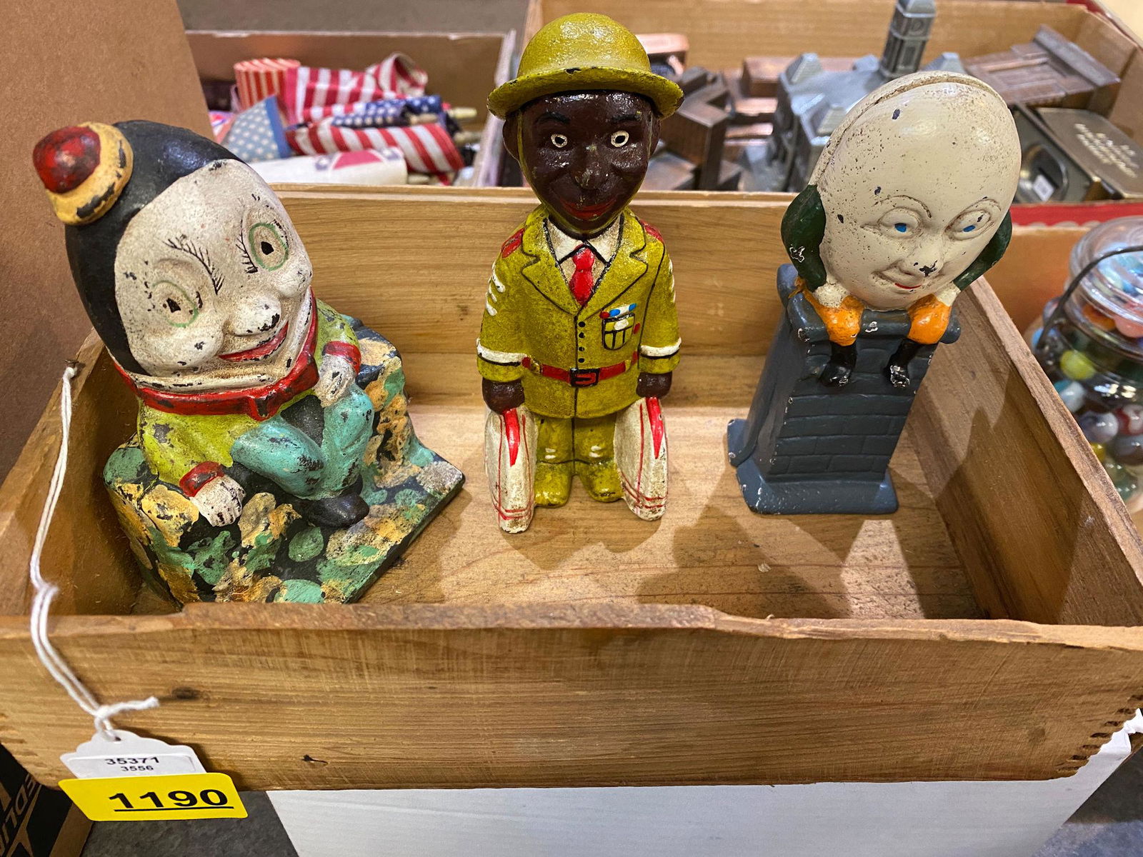 THREE CAST IRON BANKS INCLUDING 2 HUMPTY DUMPTY AND ONE (1 of 1)