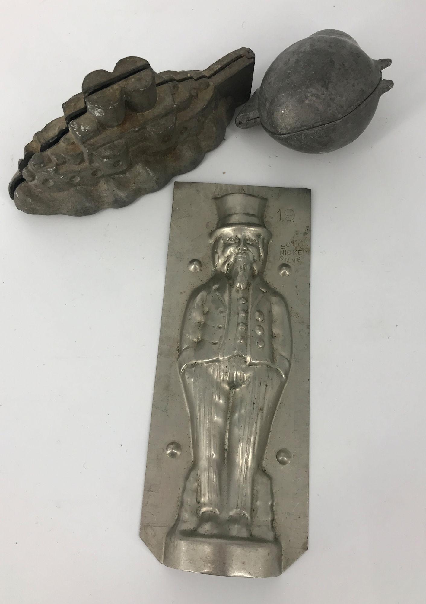 BOX LOT FOOD MOLDS INCLUDING SHIP, PEAR, AND ONE UNCLE: BOX LOT FOOD MOLDS INCLUDING SHIP, PEAR, AND ONE UNCLE SAM (ONE SIDE ONLY)