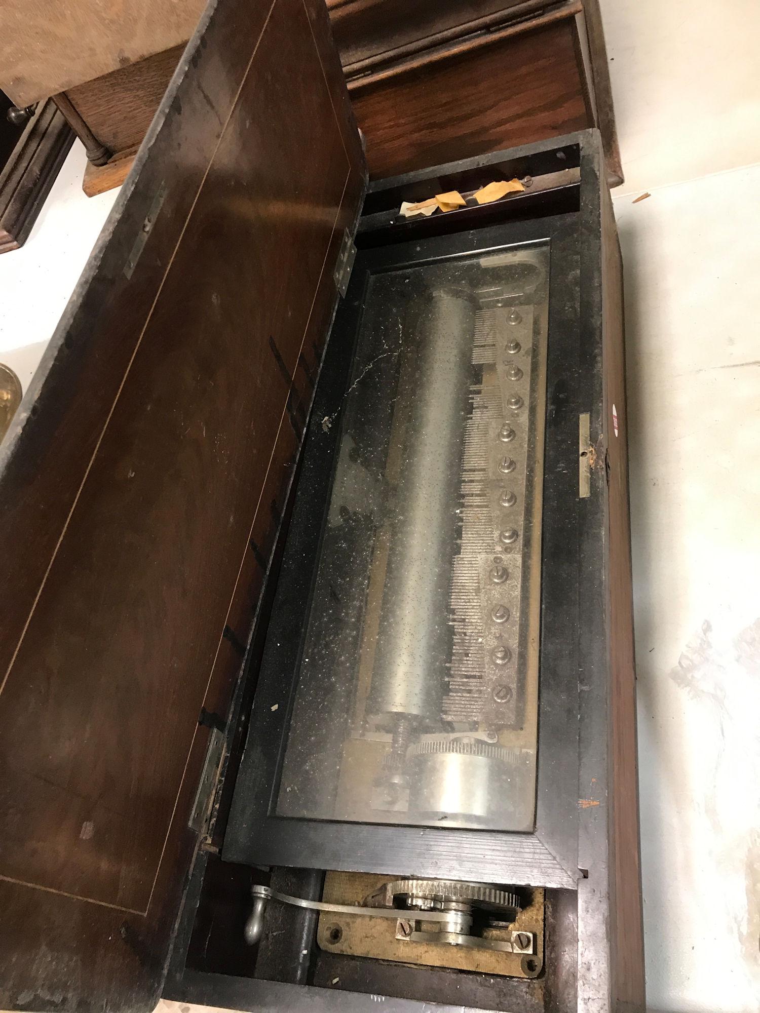 15" CYLINDER MUSIC BOX IN WOODEN CASE; SPRING IS BROKEN: 15" CYLINDER MUSIC BOX IN WOODEN CASE; SPRING IS BROKEN AND TEETH ARE MISSING.