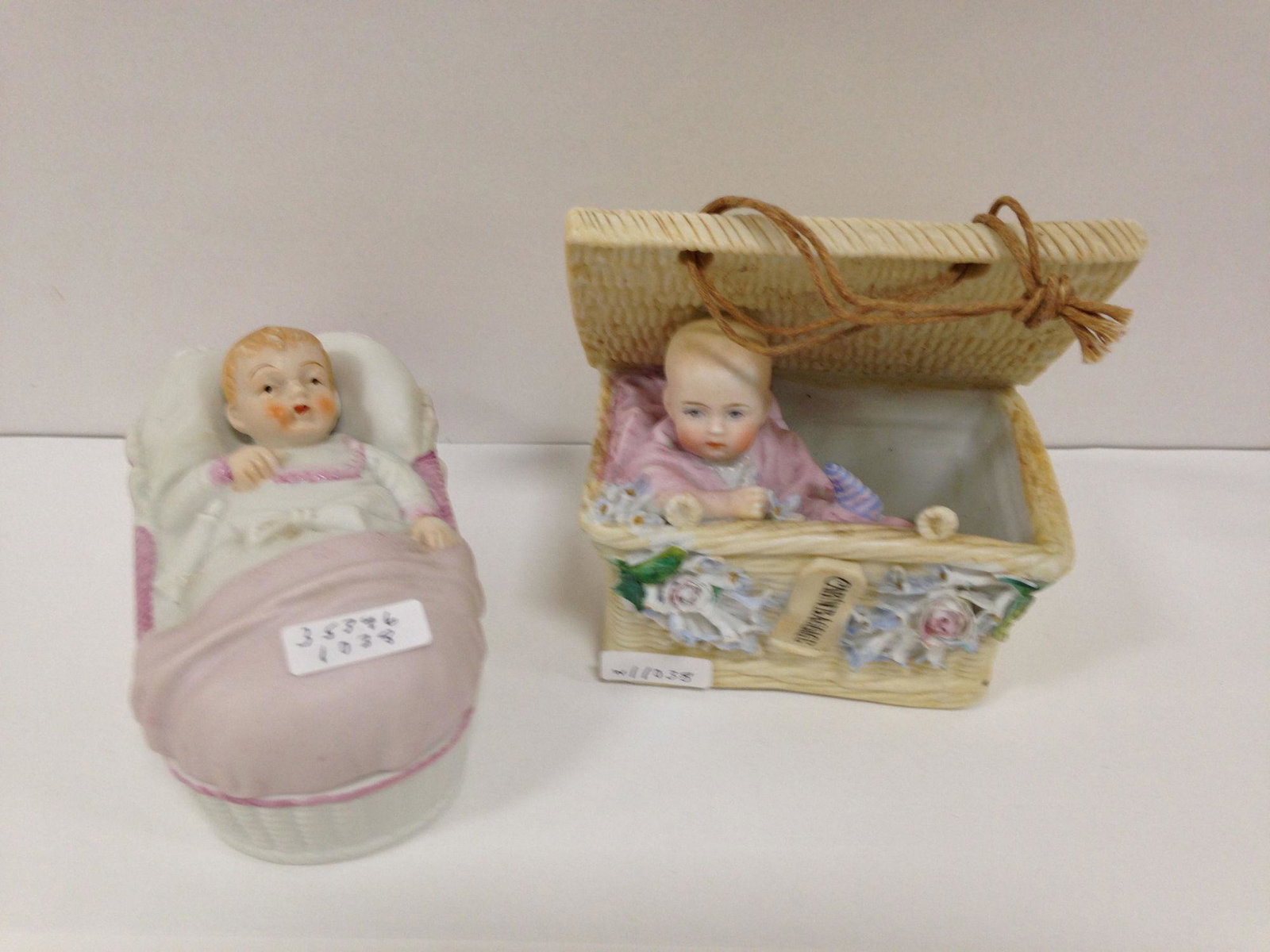 BISQUE COVERED DRESSER BOX WITH BABY IN WICKER BASKET (1 of 2)