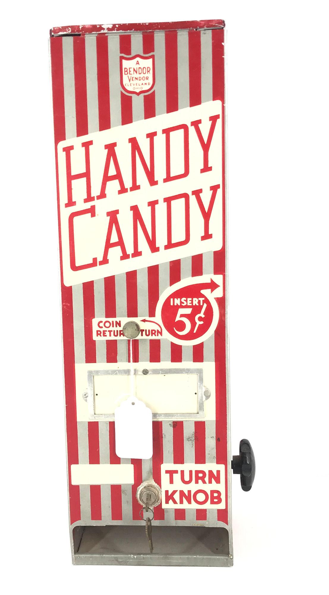 23Â¾" VINTAGE HANDY CANDY WALL VENDING MACHINE. (1 of 1)