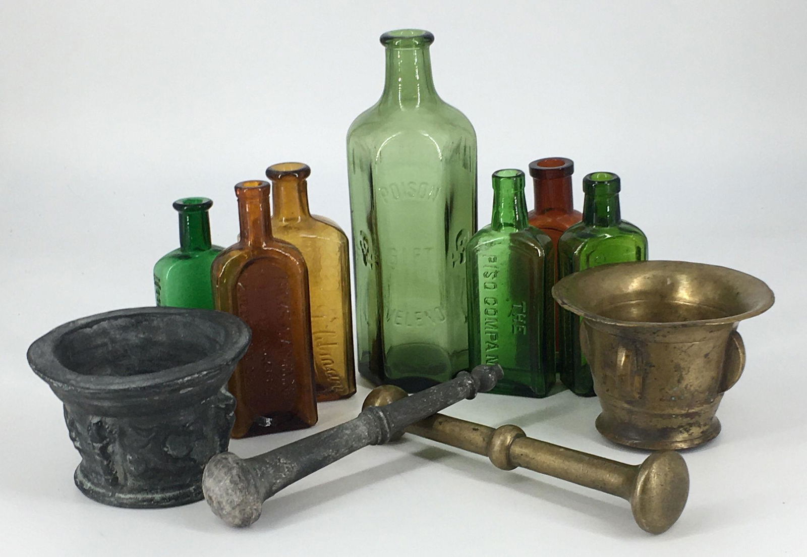 BOX LOT MORTAR AND PESTLES & MEDICINE BOTTLES. (1 of 1)