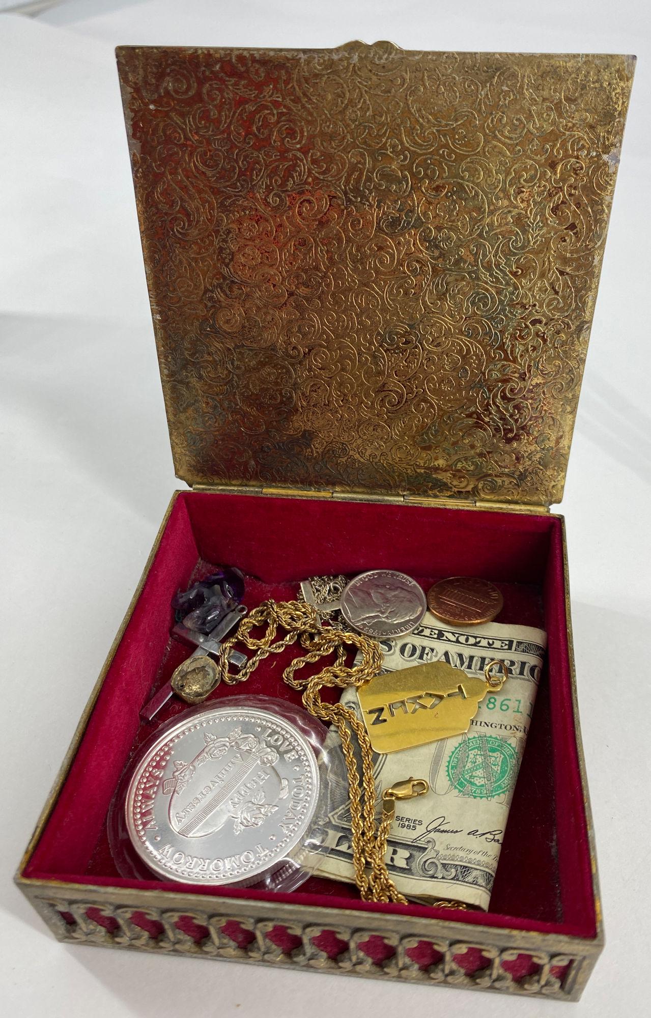 SMALL TRINKET BOX WITH CONTENTS: SMALL TRINKET BOX WITH CONTENTS ~ TWO MODERN DOLLAR BILLS. TWO MODERN U.S. COINS. ONE TROY OUNCE THREE NINES FINE SILVER TOKEN (STAMPED AND TESTED .999 SILVER) WITH WORDS "HAPPY ANNIVERSARY". TWO SILV
