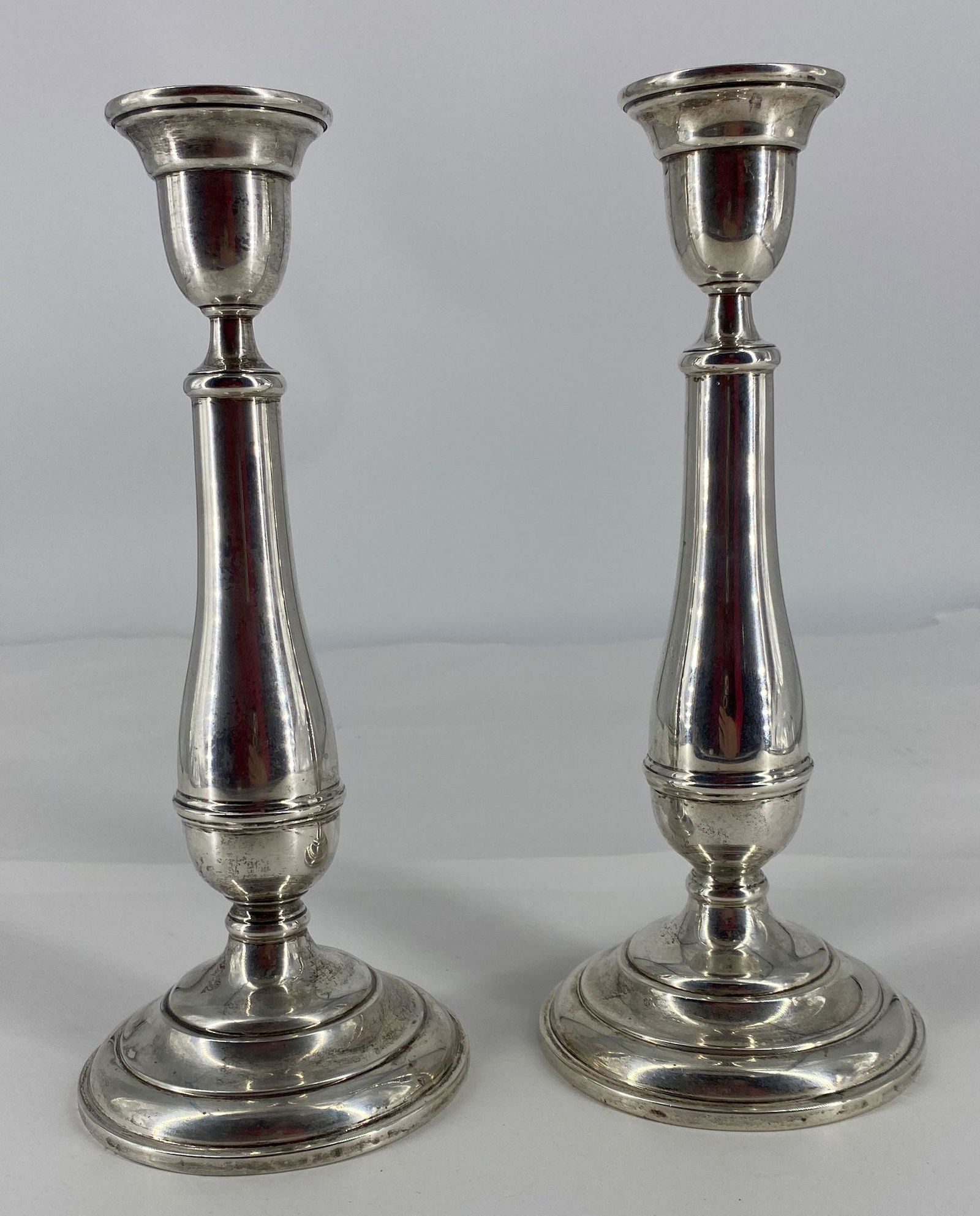 PAIR OF STERLING WEIGHTED CANDLESTICKS (1 of 4)