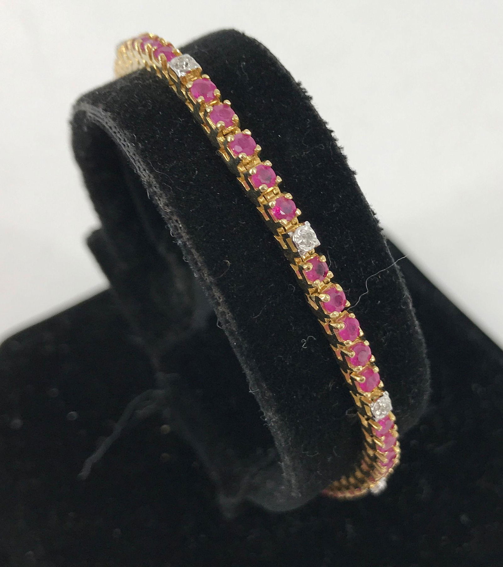 GOLD AND GEMSTONE LINE BRACELET (1 of 3)