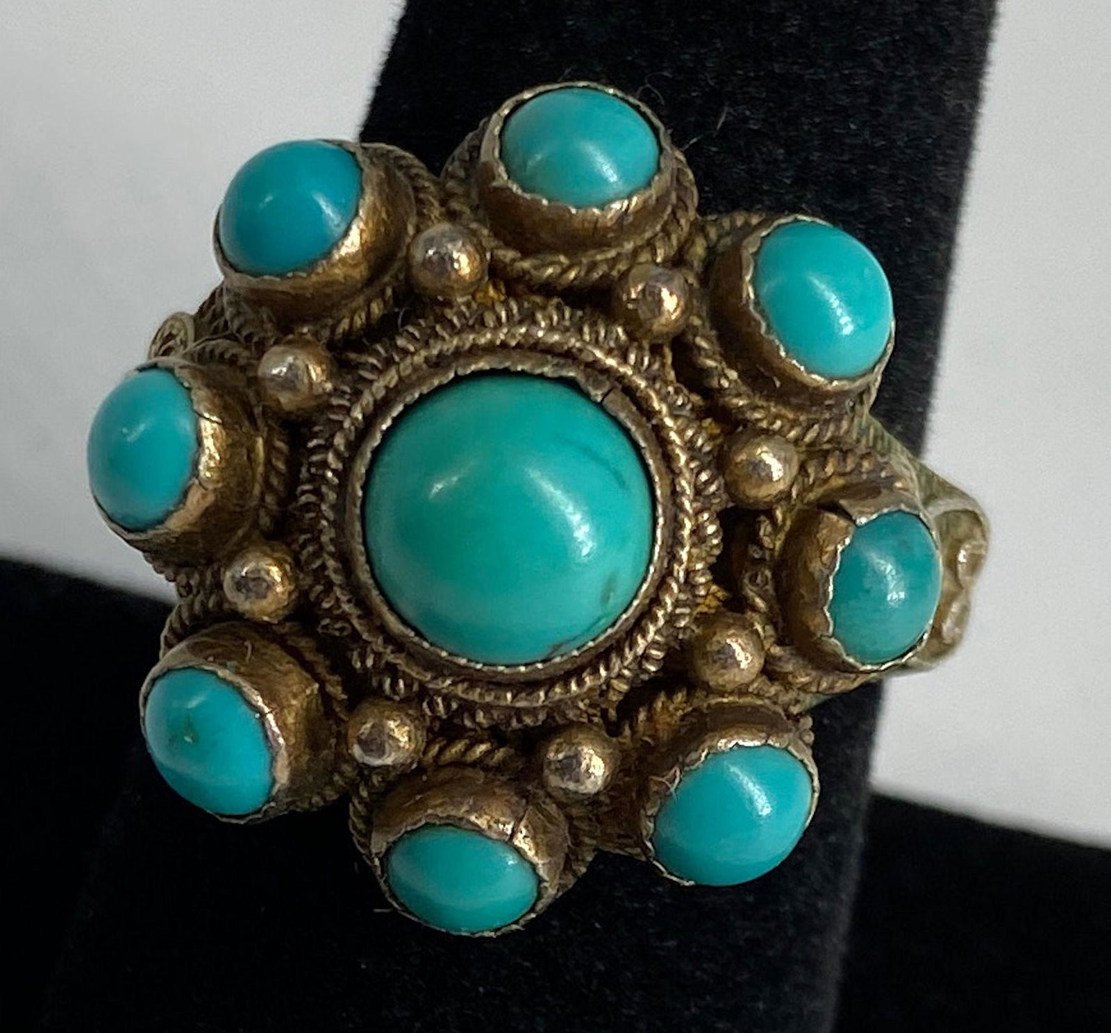 VINTAGE VERMEIL SOUTHWESTERN STYLE RING: VINTAGE VERMEIL SOUTHWESTERN STYLE RING ~ OPEN SHANK ADJUSTABLE SIZE RING FEATURING 9 PRESSED TURQUOISE CABOCHONS IN BEZEL SETTINGS, TAPERED SHANK DESIGN ACCENTED WITH ROPE STYLE EDGEWORK AND FLORAL M