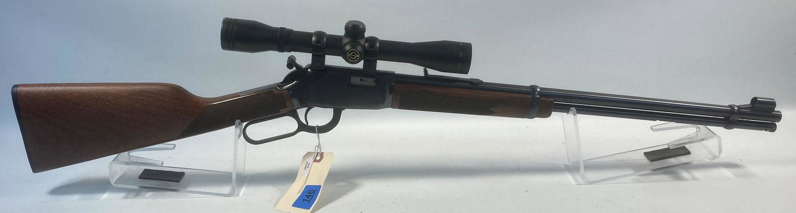 WINCHESTER MODEL 9422 .22 CALIBER LEVER RIFLE SN:: WINCHESTER MODEL 9422 .22 CALIBER LEVER RIFLE SN: F699808, INCLUDING SCOPE AND SOFT CASE. BY BIDDING ON THIS LOT BUYER ACCEPTS RESPONSIBILTY OF KNOWLEDGE OF STATE AND FEDERAL LAWS FOR RECEIVING THIS I