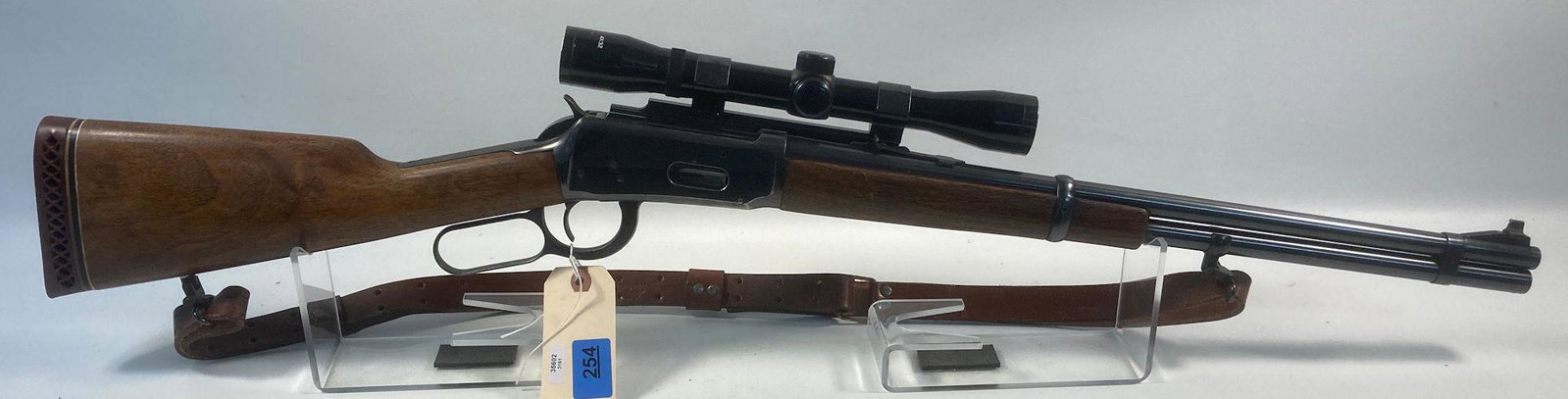 WINCHESTER MODEL 94 .30-30 CALIBER LEVER RIFLE SN:: WINCHESTER MODEL 94 .30-30 CALIBER LEVER RIFLE SN: 1448824, INCLUDING SCOPE, SLING, BUTT PAD ADDED AND SOFT CASE. BY BIDDING ON THIS LOT BUYER ACCEPTS RESPONSIBILITY OF KNOWLEDGE OF STATE AND FEDERAL 