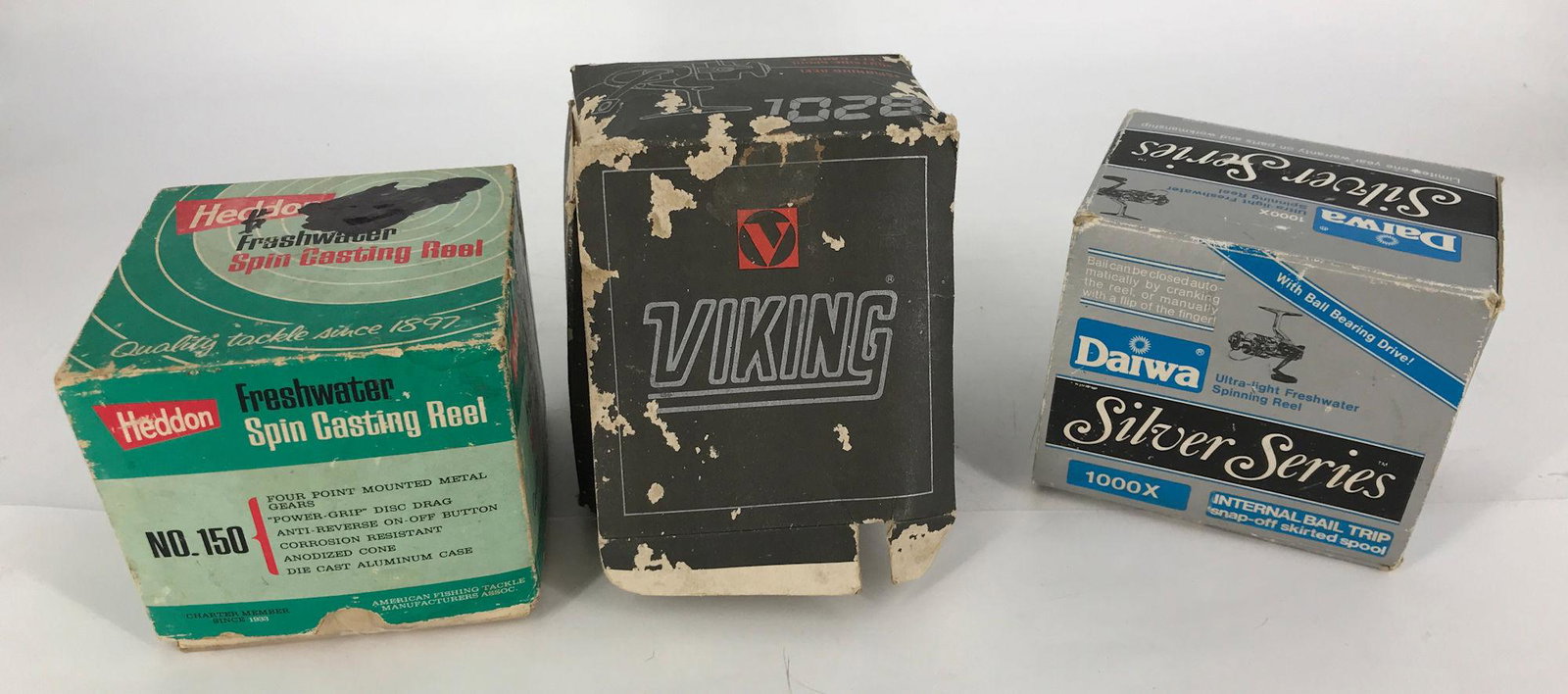 BOX LOT OF 3 FISHING REELS WITH BOXES, HEDDON #150,: BOX LOT OF 3 FISHING REELS WITH BOXES, HEDDON #150, DAIWA SILVER SERIES 1000X, VIKING 800 SERIES