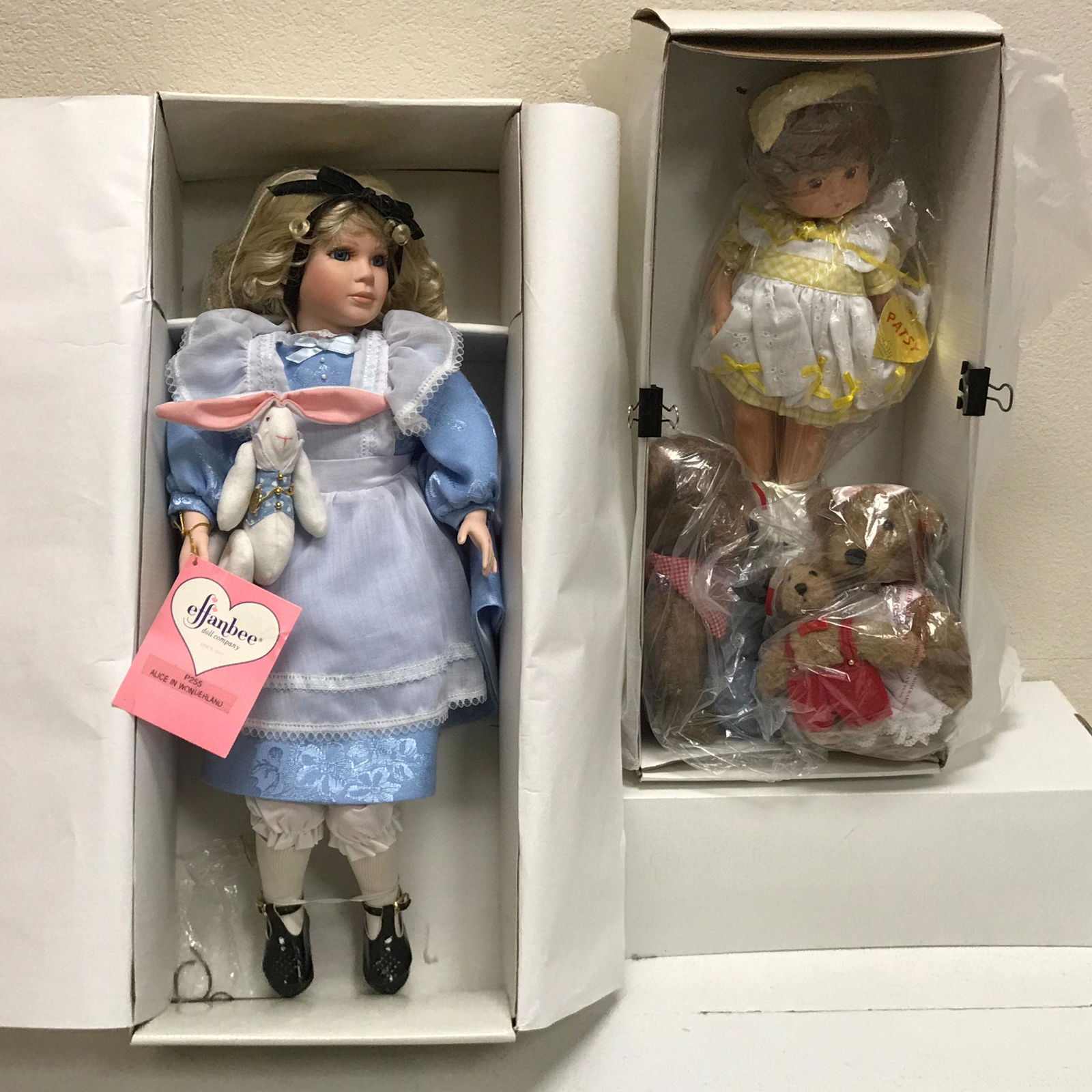 2 BOXED EFFANBEE DOLLS INCLUDING ALICE IN WONDERLAND.: 2 BOXED EFFANBEE DOLLS INCLUDING ALICE IN WONDERLAND. ALL ITEMS ARE SOLD AS IS. CONDITION REPORTS ARE NOT AVAILABLE.