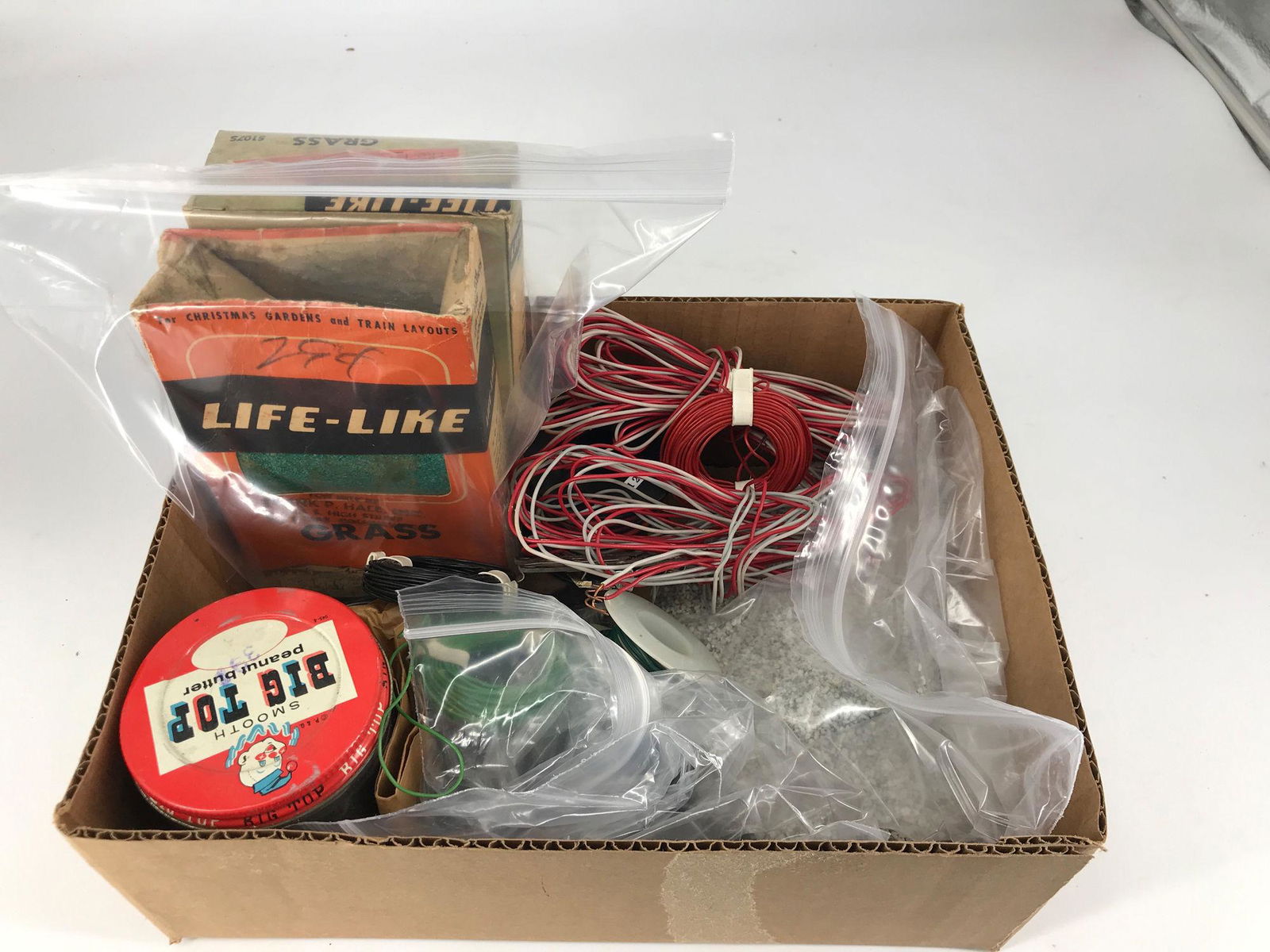 BOX LOT OF WIRE, ARTIFICIAL GRASS, COAL, AND GRAVEL (1 of 6)