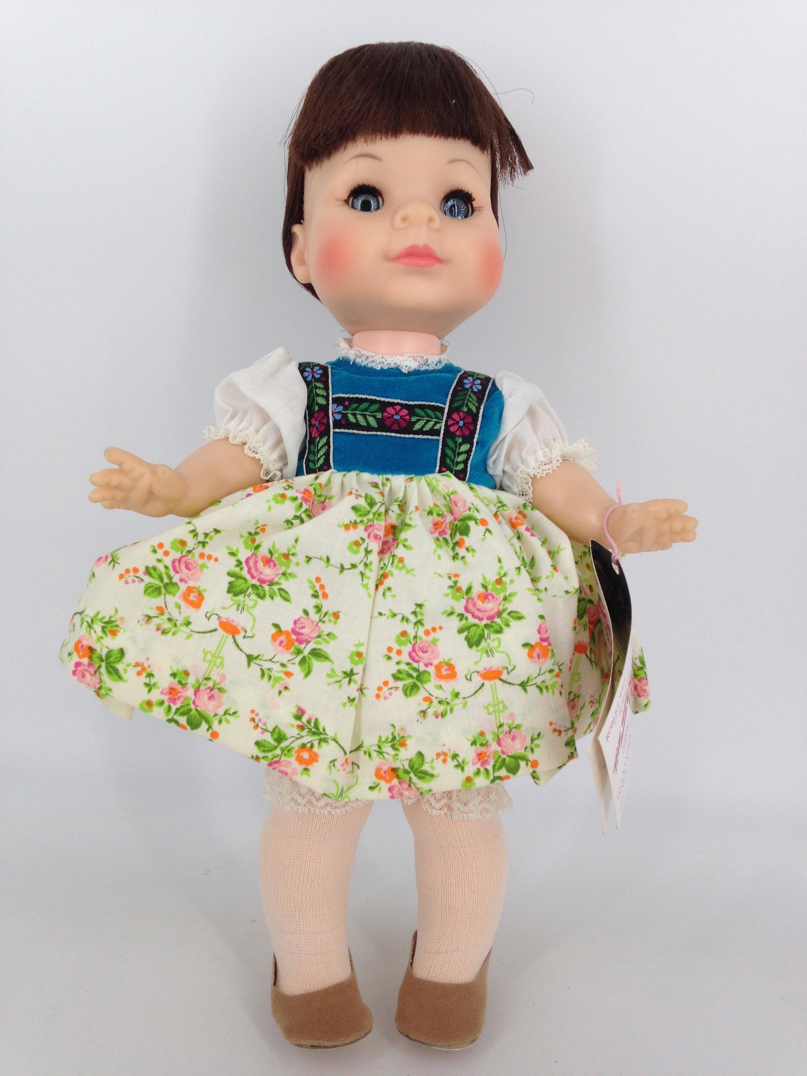 11 1/2" MADAME ALEXANDER VINYL "MARTA" FROM THE SOUND: 11 1/2" MADAME ALEXANDER VINYL "MARTA" FROM THE SOUND OF MUSIC SERIES. ALL ORIGINAL IN BOX, ROOTED HAIR, SLEEP EYES, CLOSED MOUTH, ON FIVE-PIECE VINYL BODY. DOLL WEARS TAGGED DRESS AND RETAINS ORIGINA