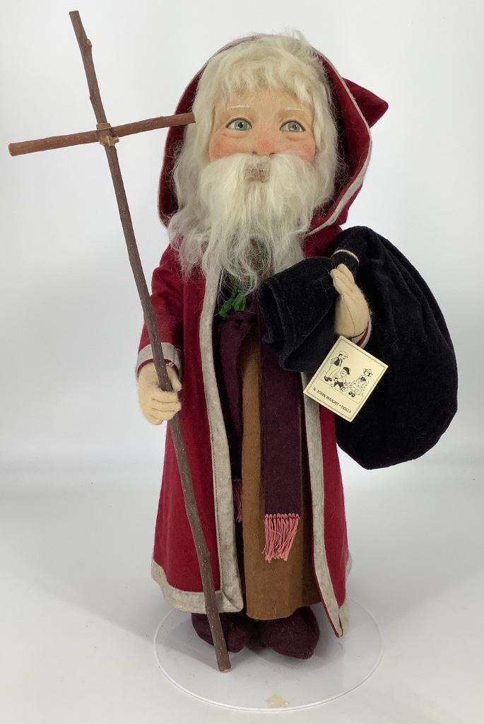 17 1/2" R. John Wright St. Nicholas. All Felt with: 17 1/2" R. John Wright St. Nicholas. All Felt with mohair wig and beard, molded and painted character face, five-piece body with disk jointed arms and legs. Dressed in original costume he retains his