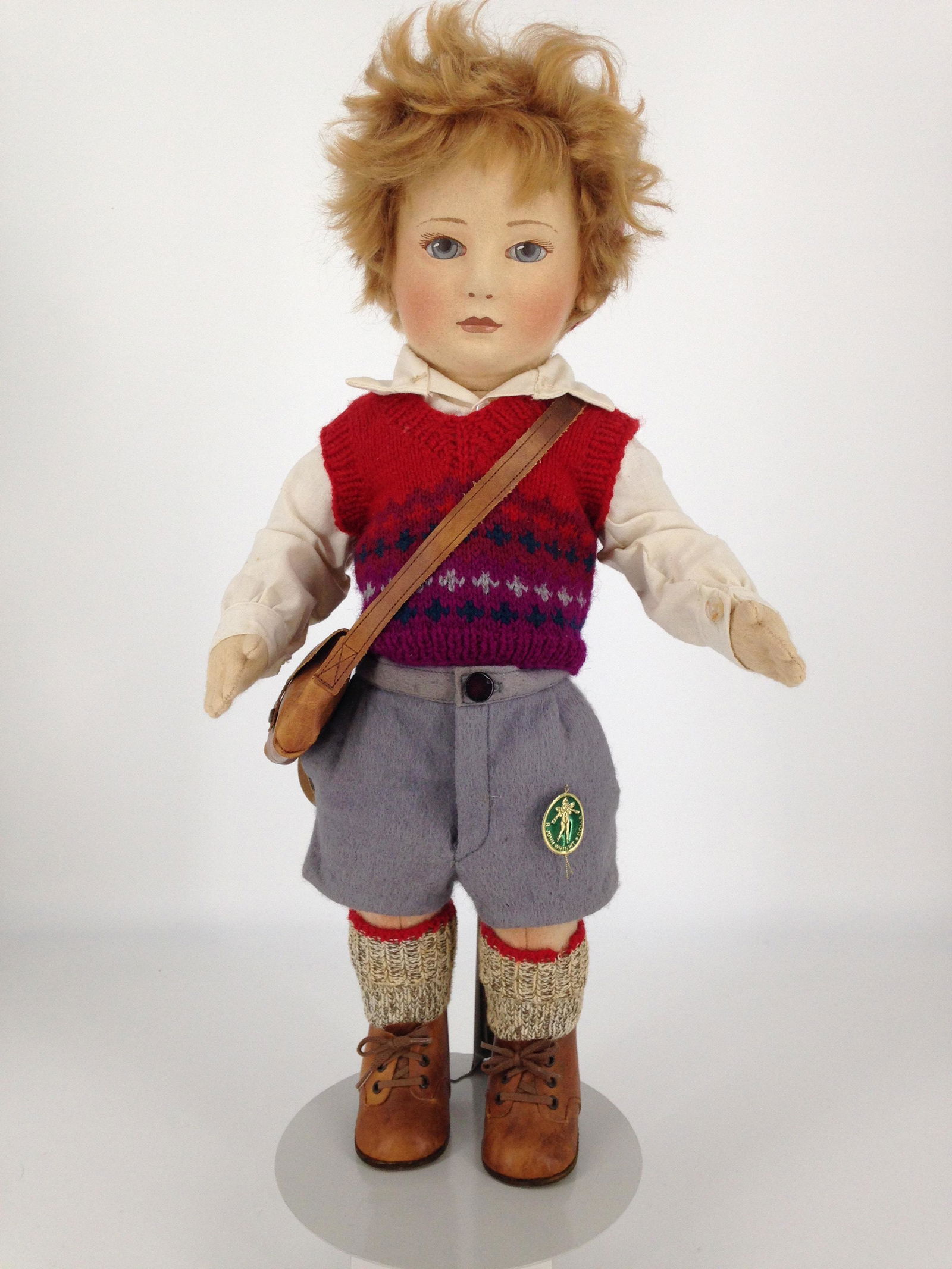 17" R. JOHN WRIGHT "SCOTT". ALL FELT DOLL FROM THE: 17" R. JOHN WRIGHT "SCOTT". ALL FELT DOLL FROM THE LITTLE CHILDREN SERIES II, MOLDED AND PAINTED FACIAL FEATURES, MOHAIR WIG, DISK JOINTED AT NECK, SHOULDERS AND HIPS, DRESSED IN ORIGINAL CLOTHING COM