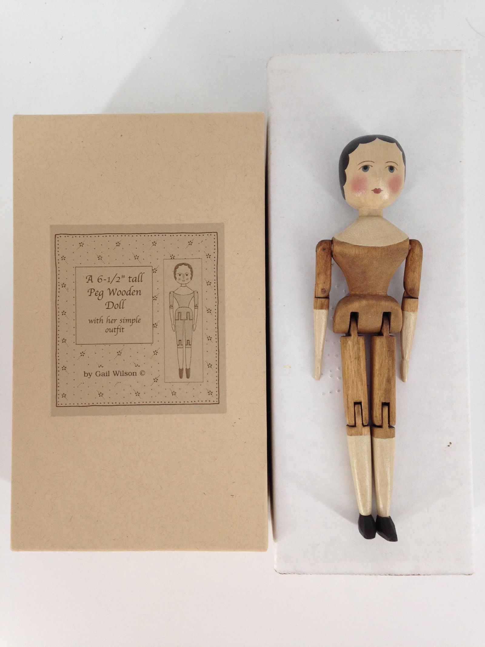 6 1/2" JOINTED PEG WOODEN DOLL BY GAIL WILSON. ALL WOOD (1 of 1)