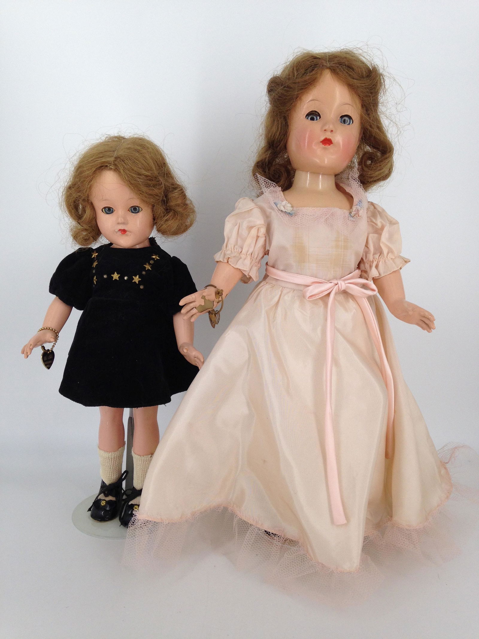 (2) VINTAGE EFFANBEE COMPOSITION DOLLS. INCLUDES 18": (2) VINTAGE EFFANBEE COMPOSITION DOLLS. INCLUDES 18" MARKED "EFFANBEE USA", HUMAN HAIR WIG, SLEEP EYES, CLOSED MOUTH, ON FIVE PIECE COMPOSITION BODY, REDRESSED; AND 15" MARKED "EFFANBEE ANNE SHIRLEY",