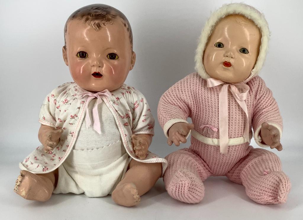 (2) unmarked composition babies. Both have molded and (1 of 1)