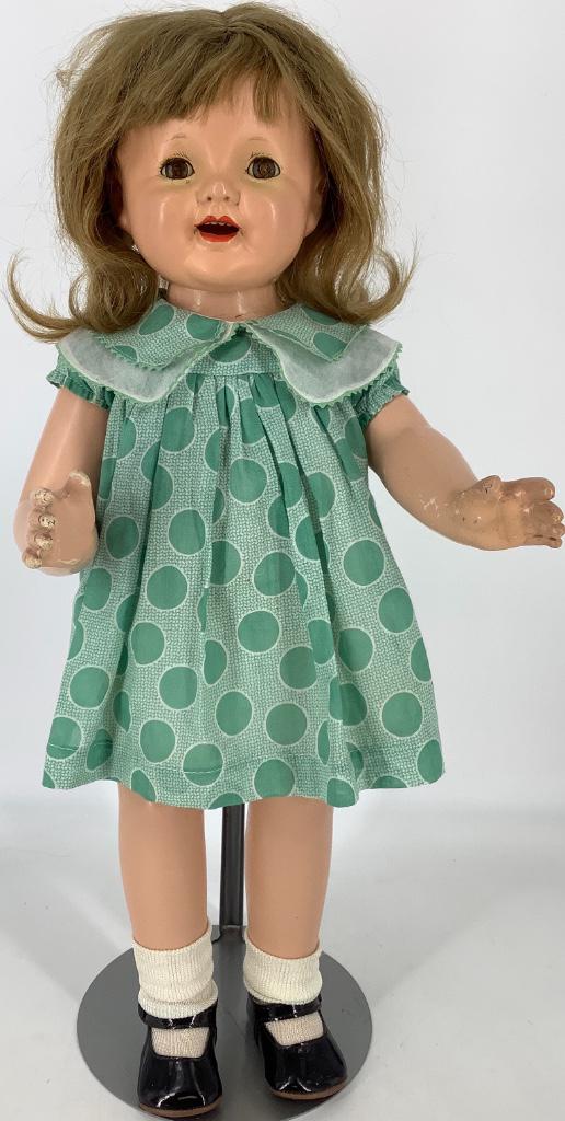 22" Effanbee composition girl, possibly Patsy Ann.: 22" Effanbee composition girl, possibly Patsy Ann. Human hair wig over molded hair, sleep eyes, open smiling mouth with teeth, on five-piece body marked "Effanbee Patsy Lou" on back of torso. Head is