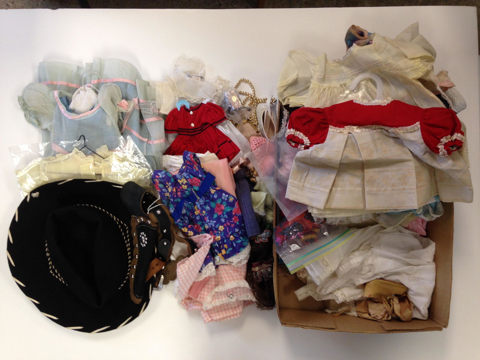 LOT OF MISCELLANEOUS SIZE DOLL CLOTHES AND ACCESSORIES (1 of 1)