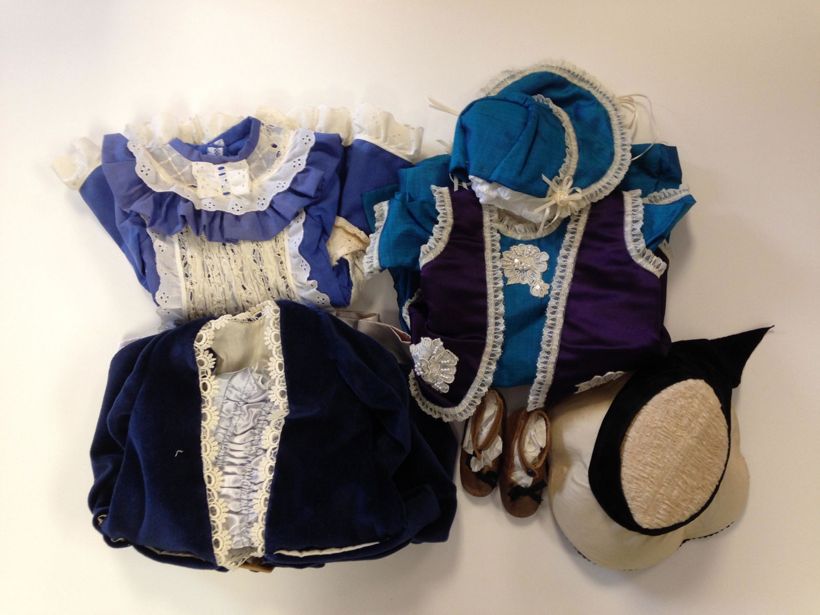 (3) ANTIQUE STYLE DOLL DRESSES, HAT AND PAIR OF ANTIQUE (1 of 1)