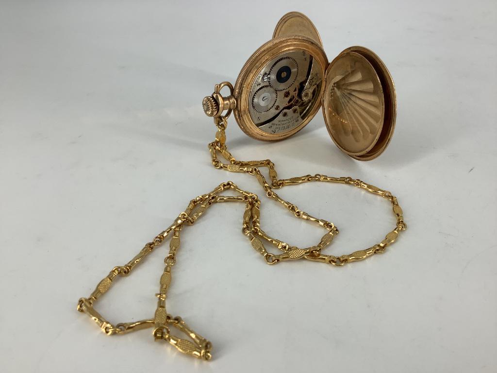Vintage Waltham Pocket Watch: Vintage Waltham Pocket Watch Winds, sets and ticks at time of listing. White face with black numeric indicators. On gold-filled fob/chain. warranted 25 year g.f. case from Crescent. 17-jewel movement 