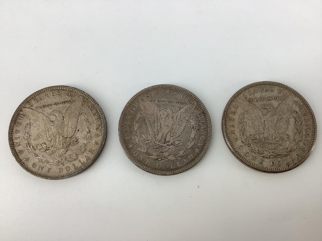 Three Morgan Silver Dollar Coins (1 of 2)