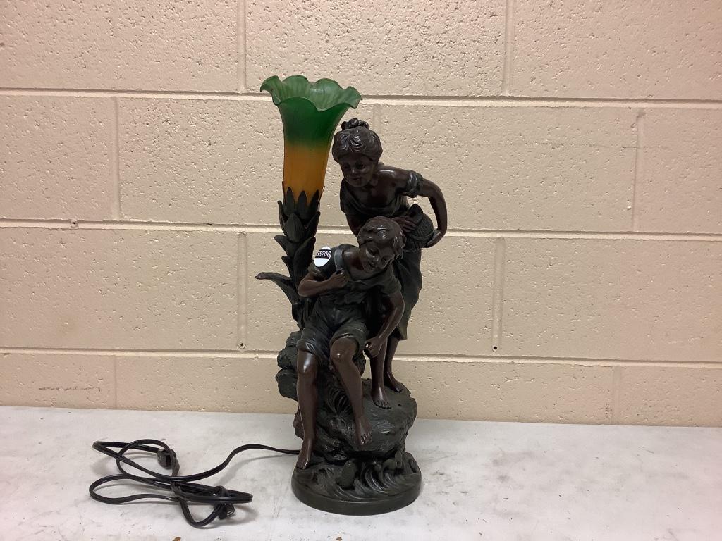 Reproduction Spelter figurative lamp with tulip shade.: Reproduction Spelter figurative lamp with tulip shade. Missing fishing pole. Measures 19 inches tall.
