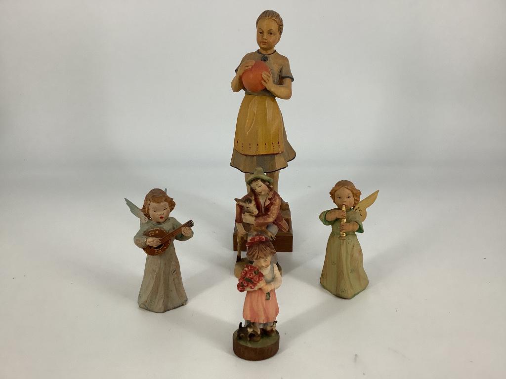 Box lot small carved wooden figures. (1 of 3)