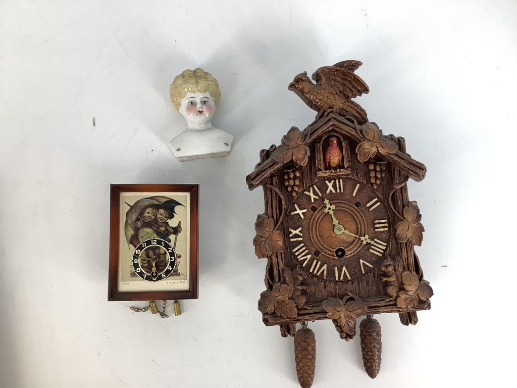 Box lot 2 small clocks and china doll head. (1 of 1)