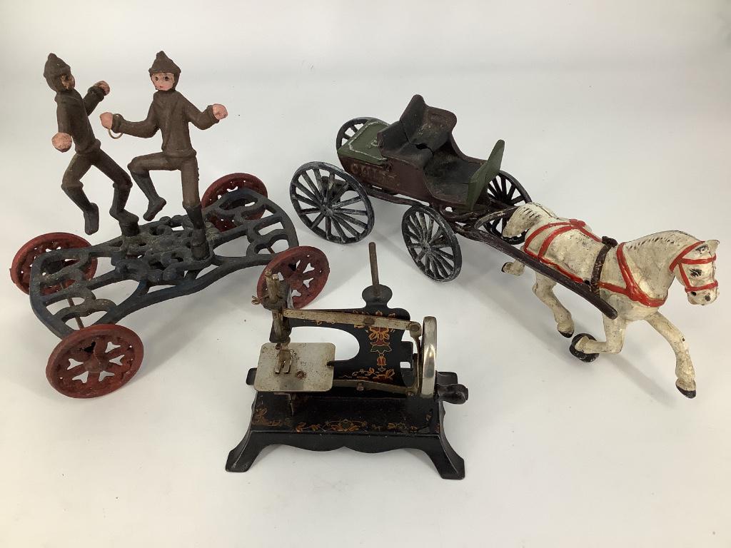 Box lot - two cast iron toys and tin toy sewing machine (1 of 4)